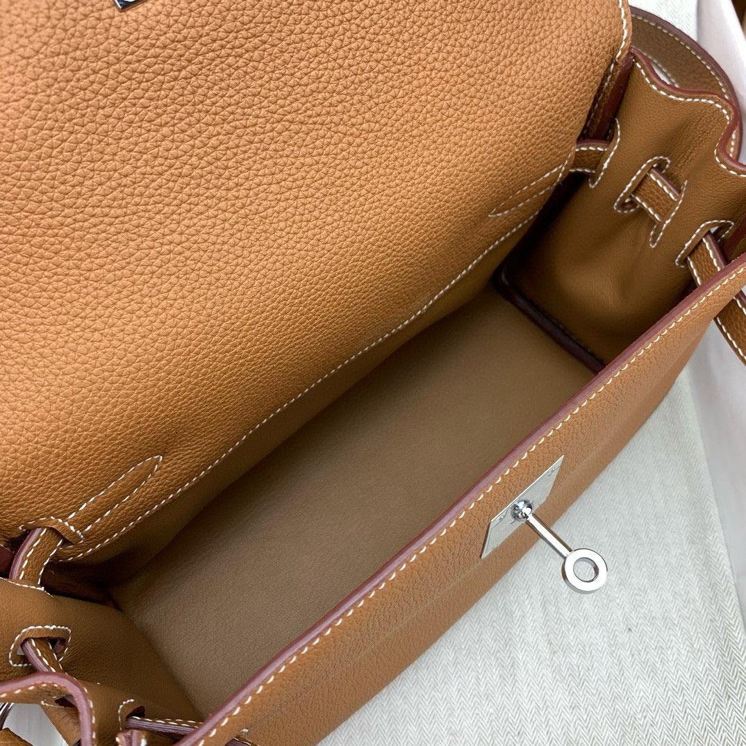 HERM KELLY MESSENGER 25