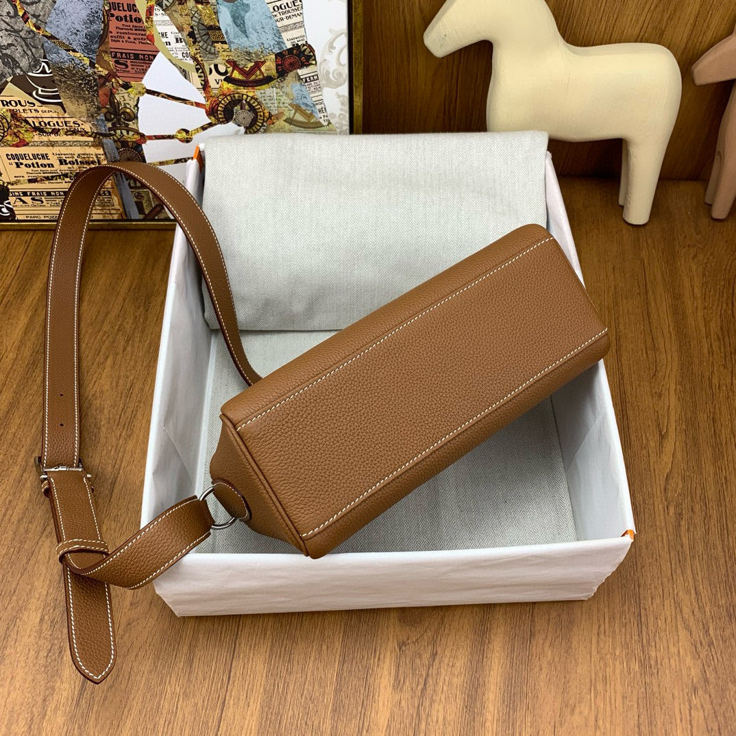 HERM KELLY MESSENGER 25