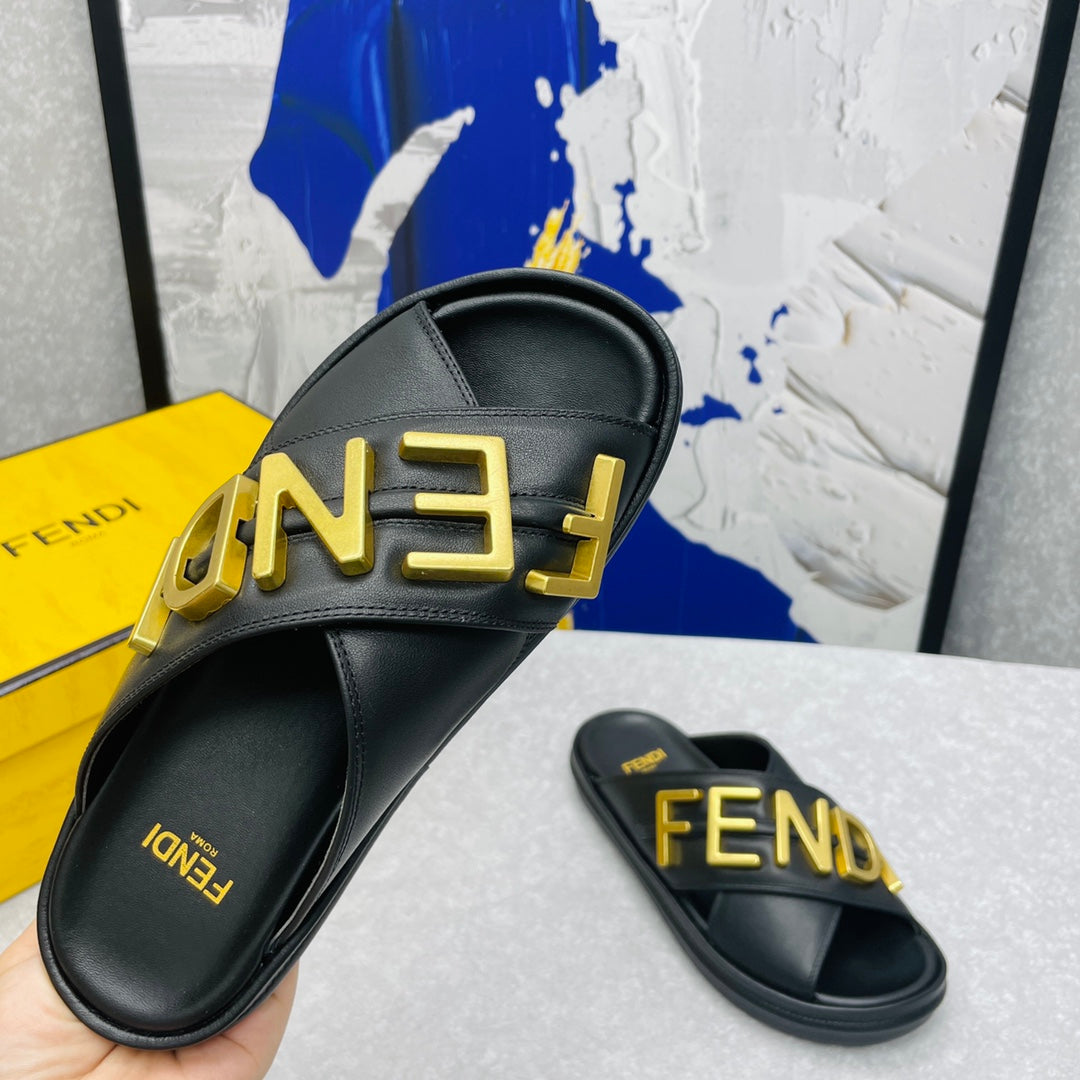 FENDI GRAPHY LOGO LETTERING SLIDES IN BLACK LAMBSKIN WITH GOLD HARDWARE