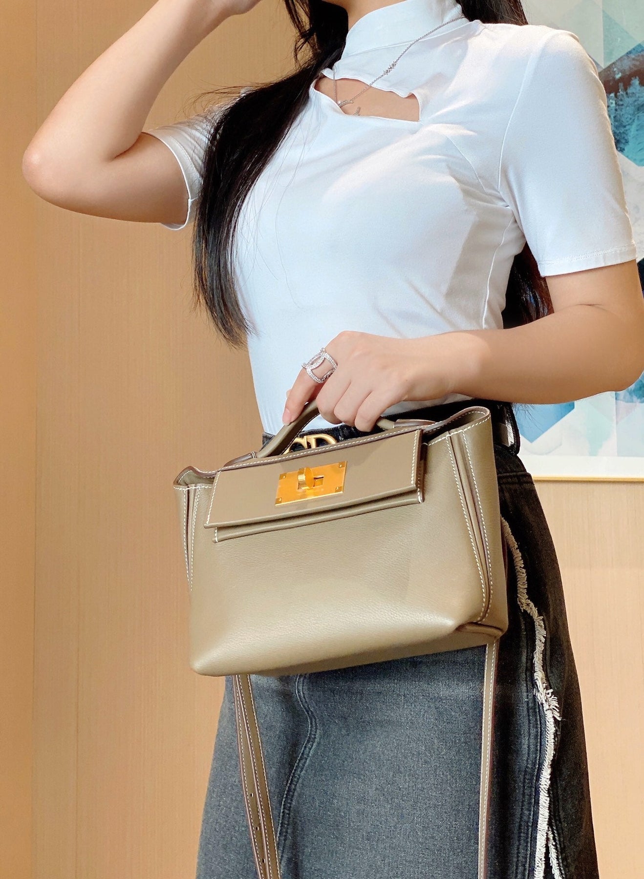 MINI 24/24 21CM IN TOGO ETOUPE EVERCOLOR CALFSKIN GOLD KELLY BUCKLE