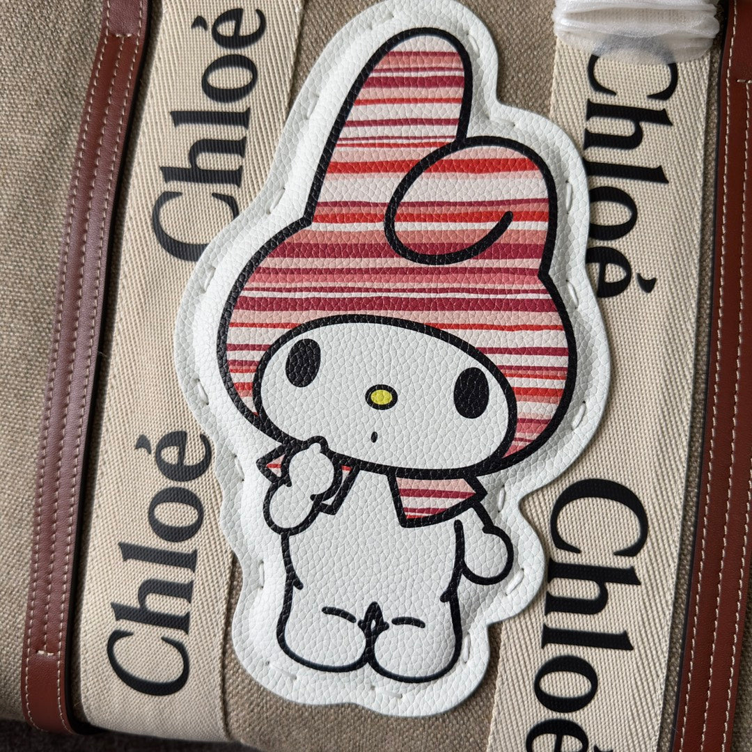 MY MELODY MEDIUM WOODY TOTE BAG 37 IN NATURAL FIBERS BEIGE WEBBING BROWN CALFSKIN