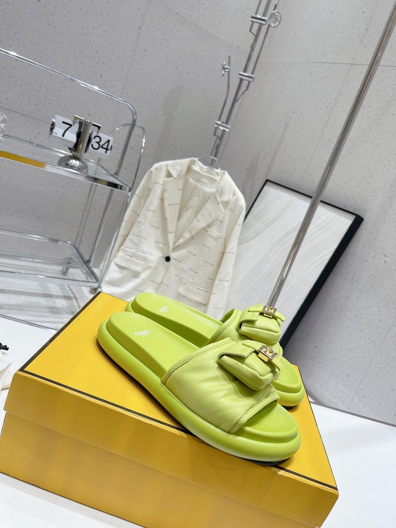FENDI BAGUETTE SLIPPERS IN PEAR GREEN LAMBSKIN WITH GOLD HARDWARE