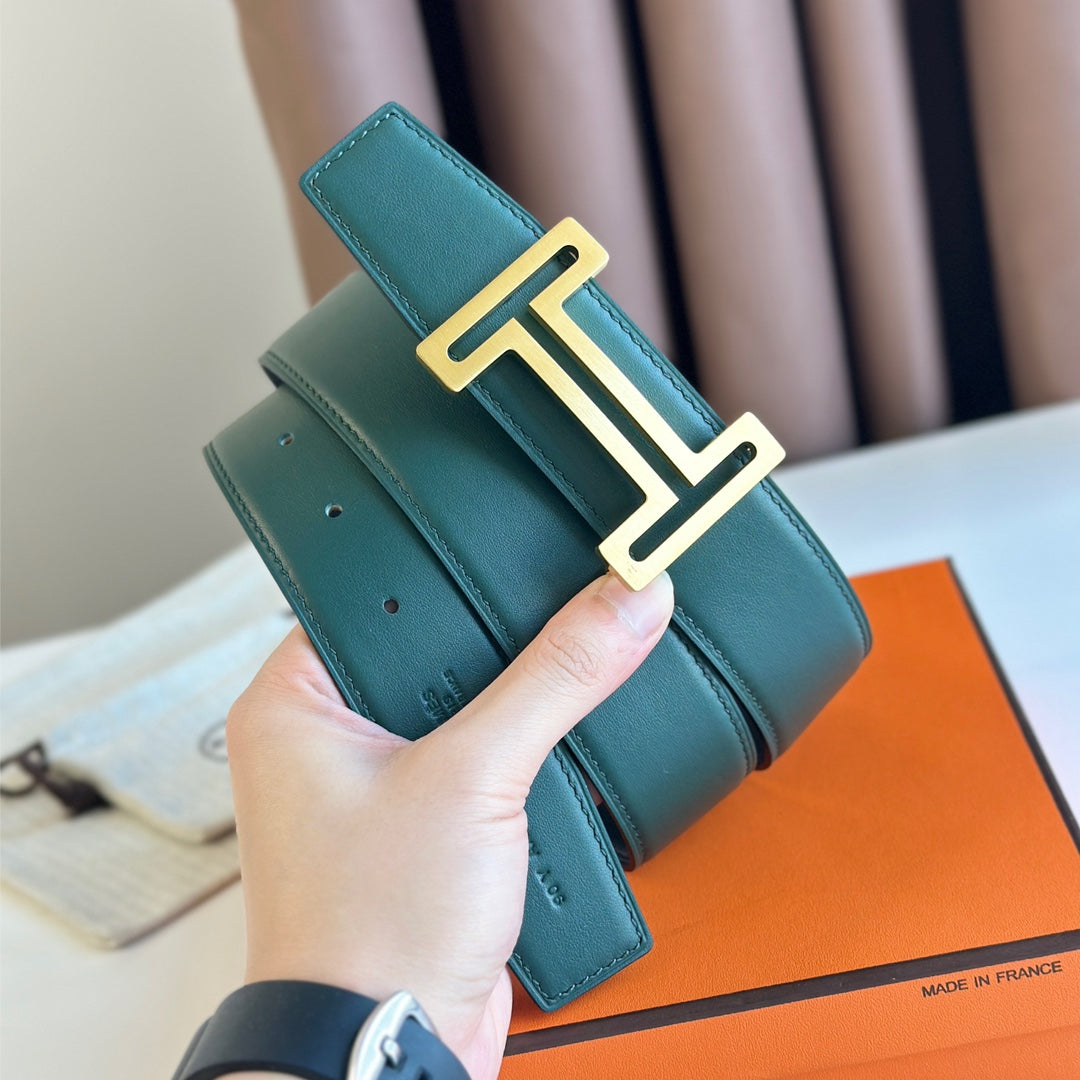 HM  BELT BUCKLE & REVERSIBLE TEAL GREEN AND BLACK LEATHER STRAP 38MM GOLD HARDWARE