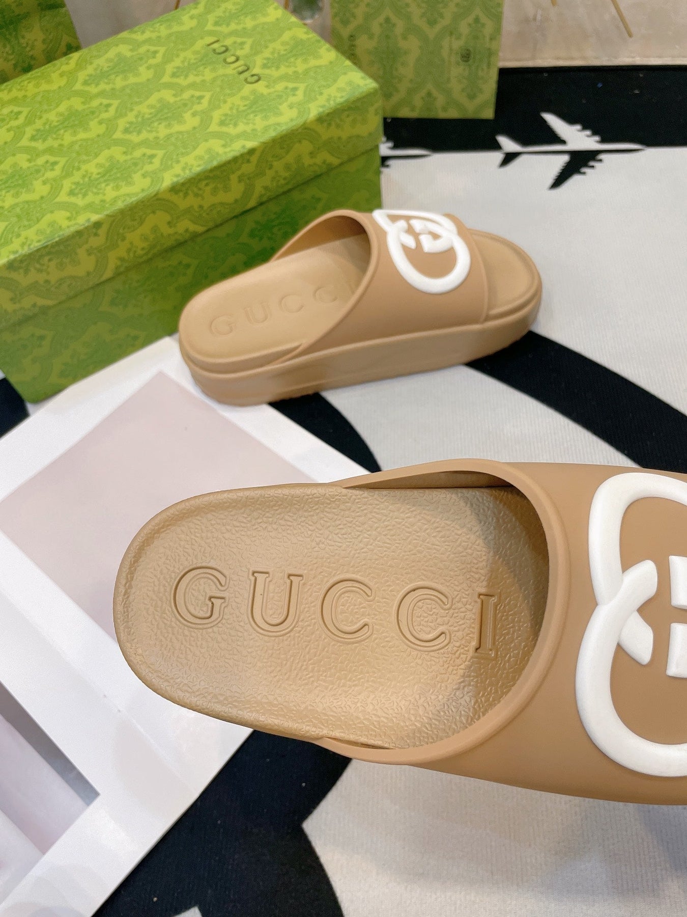 INTERLOCKING G SLIDE SANDAL IN TORTILLA BROWN IMPORTED TPU