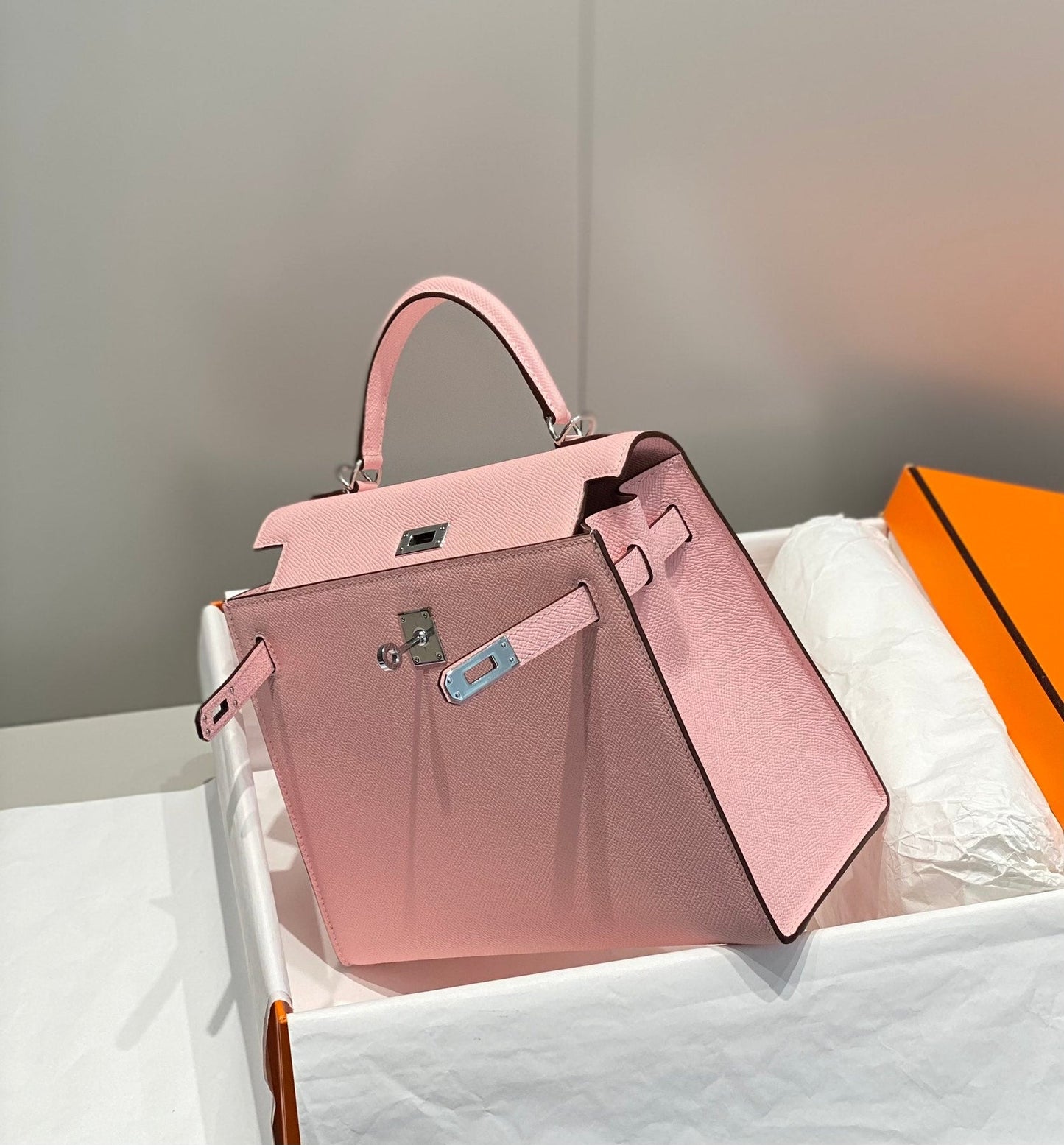 KELLY 25CM IN ROSE SAKURA SWIFT CALFSKIN SILVER HARDWARE