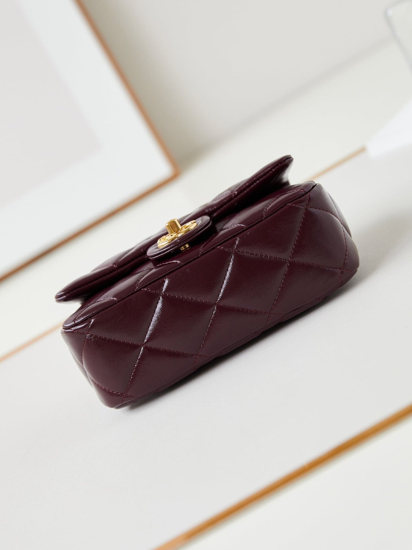 FLAP BAG WITH TOP HANDLE 19 IN WINE RED OIL-WAX LAMBSKIN GOLD HARDWARE