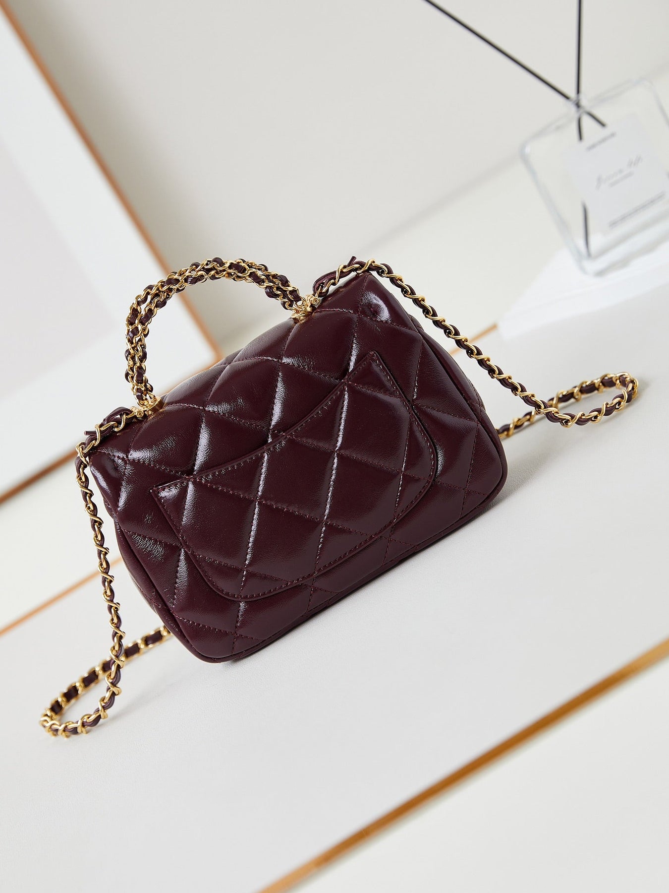 FLAP BAG WITH TOP HANDLE 19 IN WINE RED OIL-WAX LAMBSKIN GOLD HARDWARE