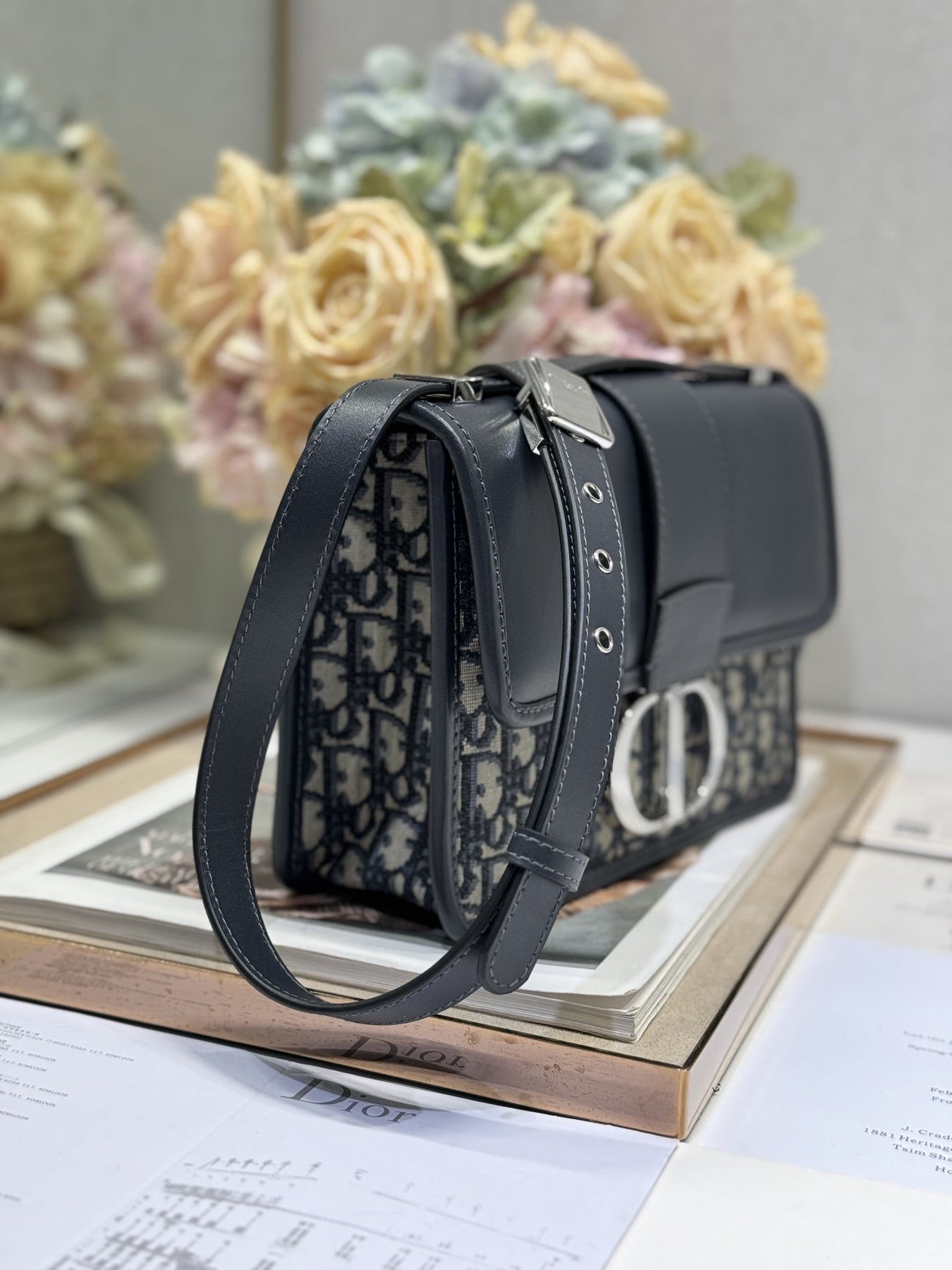 MONTAIGNE EAST-WEST BAG 24 IN BLACK LAMBSKIN AND MONOGRAM OBLIQUE JACQUARD