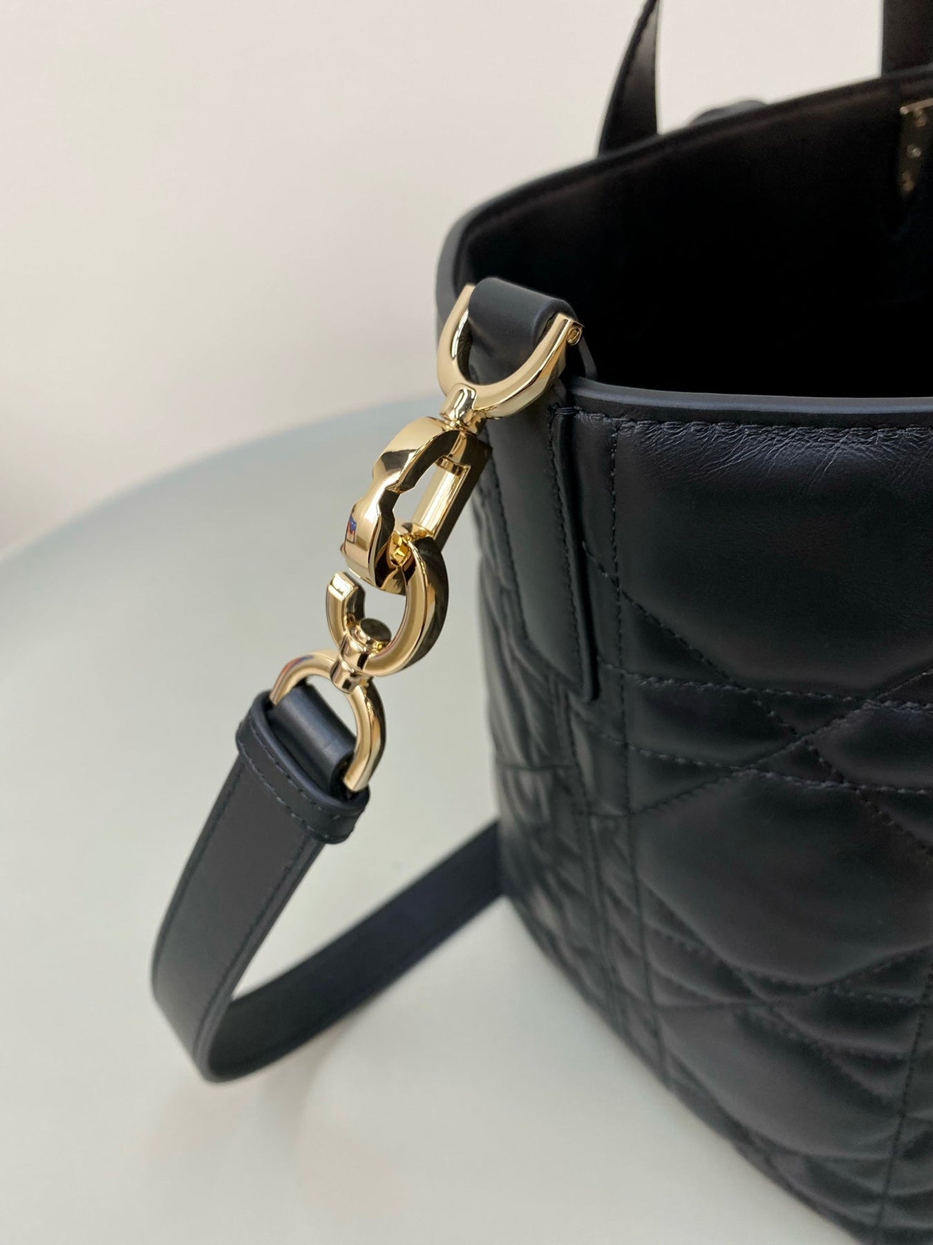 MEDIUM TOUJOURS BUCKET BAG 22 IN BLACK CANNAGE CALFSKIN