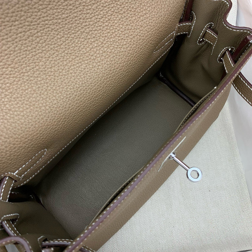 HERM KELLY MESSENGER 25