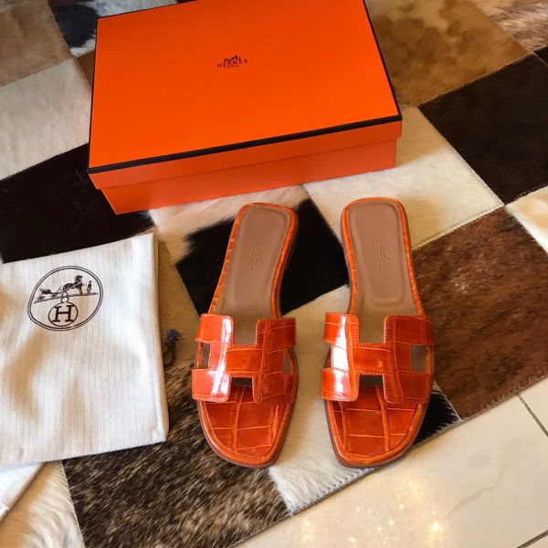 HERM Oran Slide Sandals In Orange Shiny Niloticus Crocodile Skin