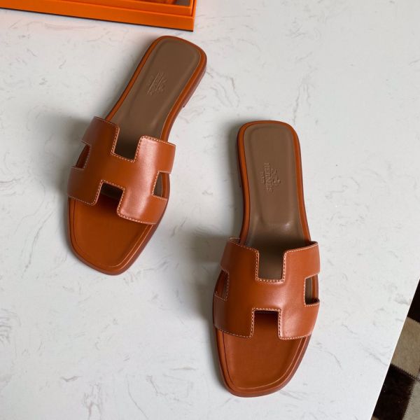 HERM Oran Slide Sandals In Gold Swift Calfskin