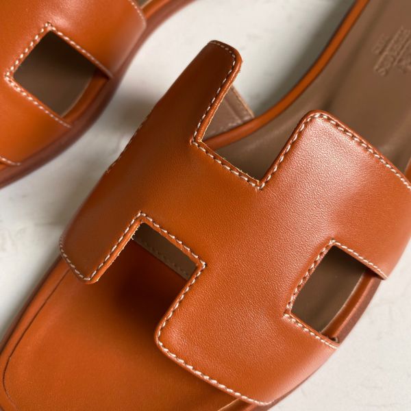 HERM Oran Slide Sandals In Gold Swift Calfskin