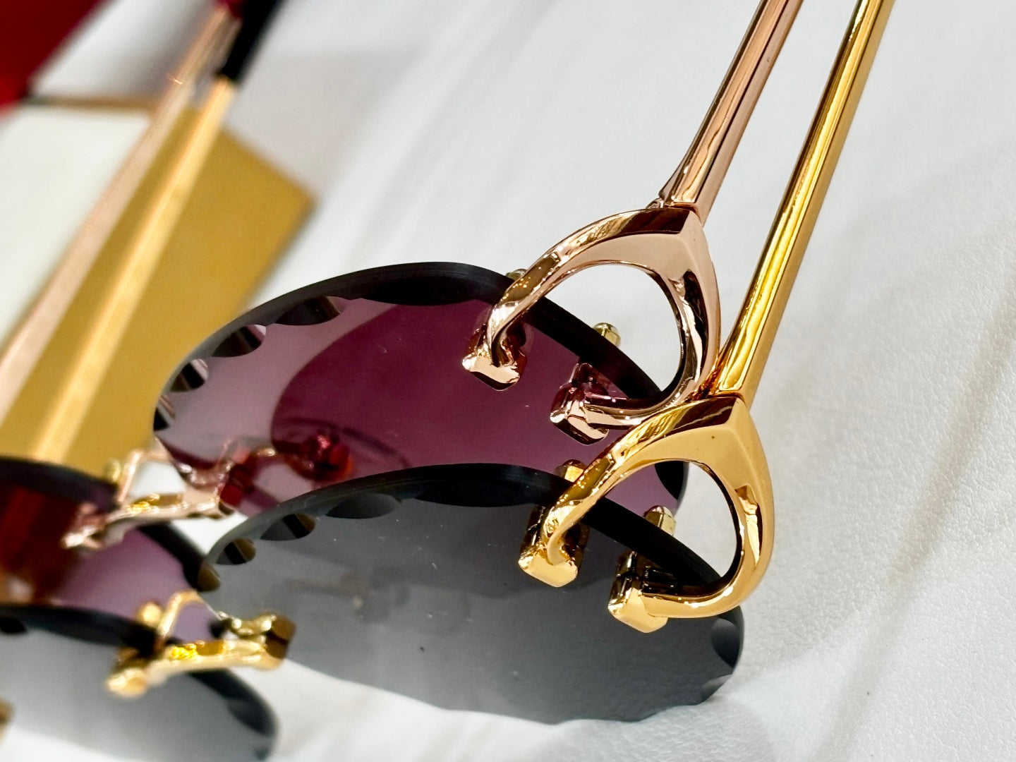 C DE RIMLESS ROUND FRAME SUNGLASSES CT0599S IN METAL