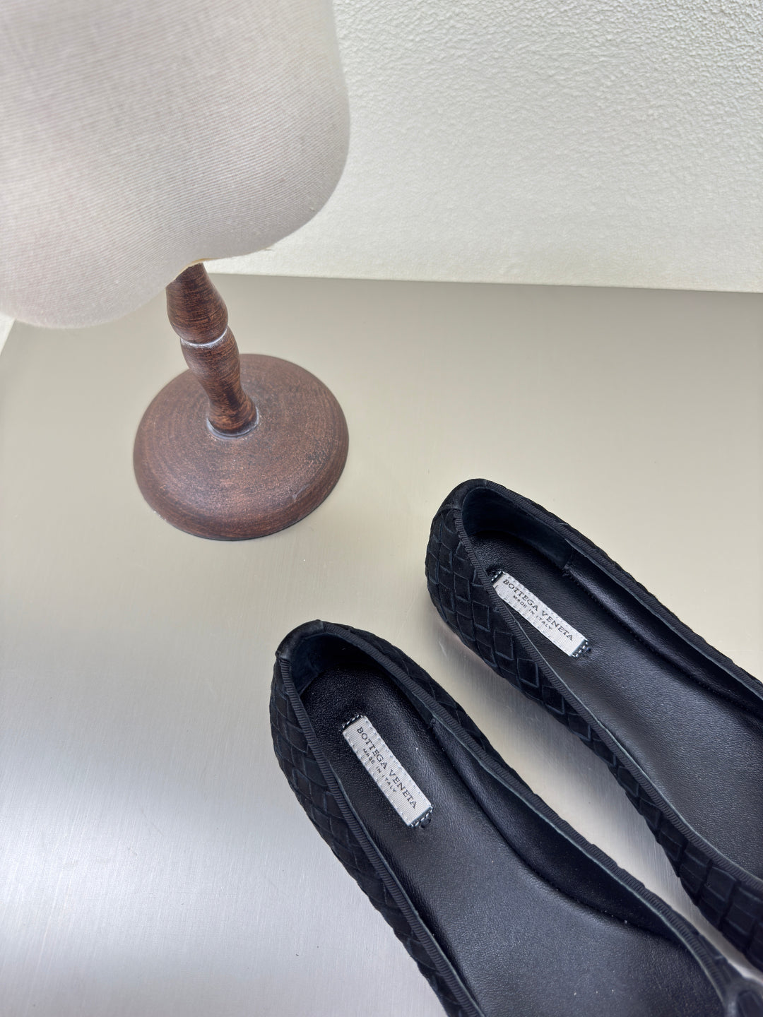 BALLET FLAT IN BLACK INTRECCIATO SUEDE WITH BOW