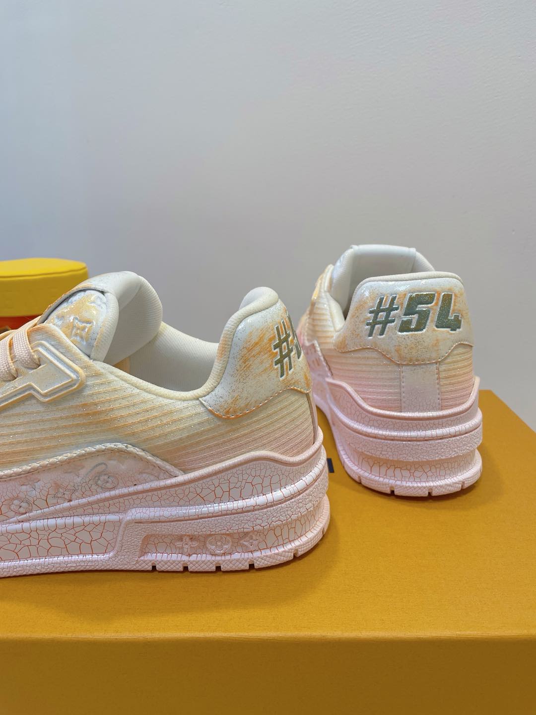 LV TRAINER MAXI SNEAKER IN LIGHT PINK OMBRE ORANGE EMBOSSED CALFSKIN