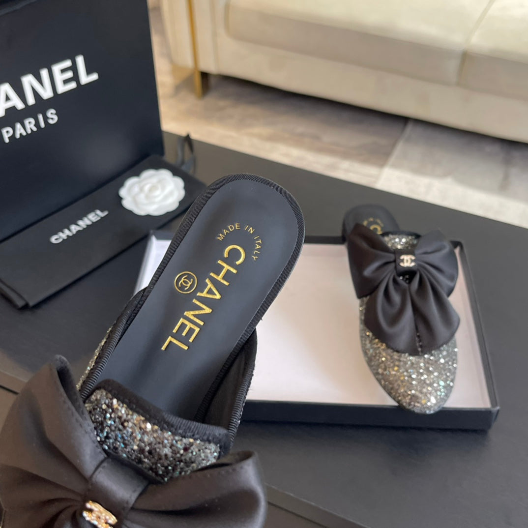 BIG BOW FLAT MULE SANDALS IN BLACK SILK WITH GLITTER SEQUINS