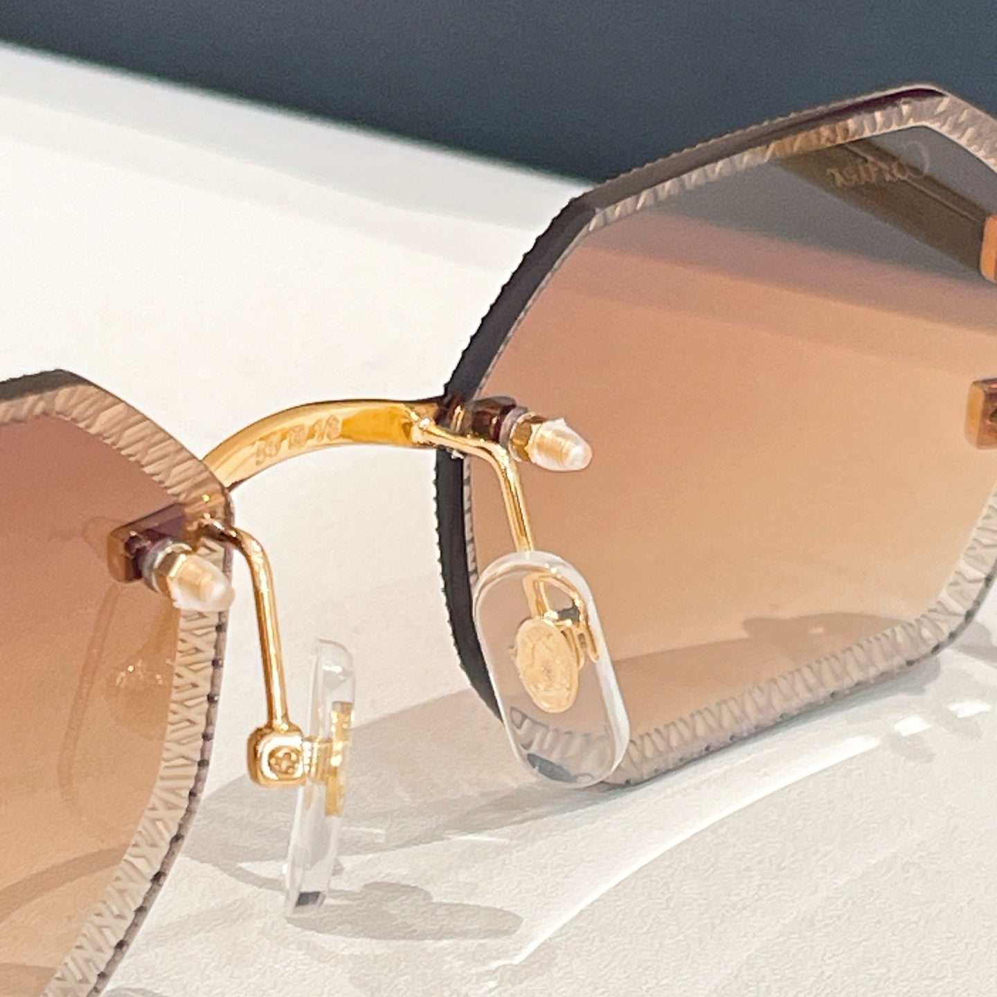 C DE RIMLESS GEOMETRIC FRAME SUNGLASSES CT0092O IN METAL