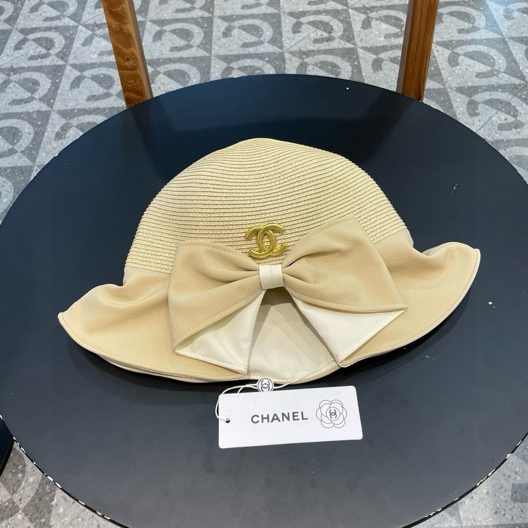 BOW BUCKET HAT IN EGG NOG BEIGE RAFFIA 426170