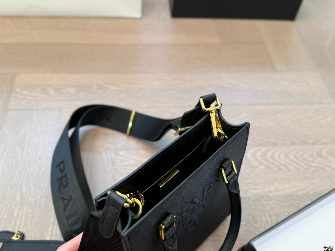 EMBOSSED LOGO MINI CROSSBODY BAG 19 IN BLACK SAFFIANO LEATHER