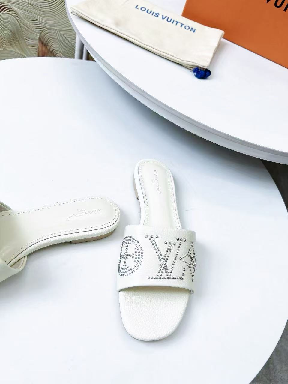FLAT SLIDE IN WHITE LAMBSKIN WITH RHINSTONES