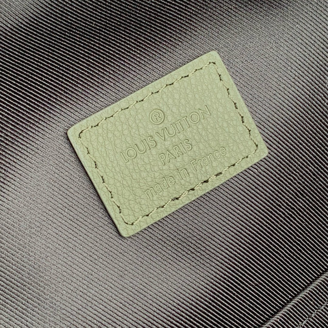 DISCOVERY PM BACKPACK 38 IN OLIVE GREEN MONOGRAM LAMBSKIN