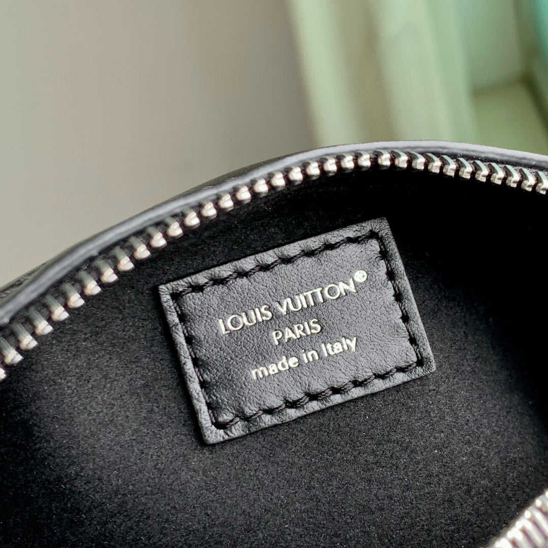 POCHETTE VIBE HANDBAG 25 IN BLACK LAMBSKIN BROWN COWHIDE AND COATED CANVAS TRIM