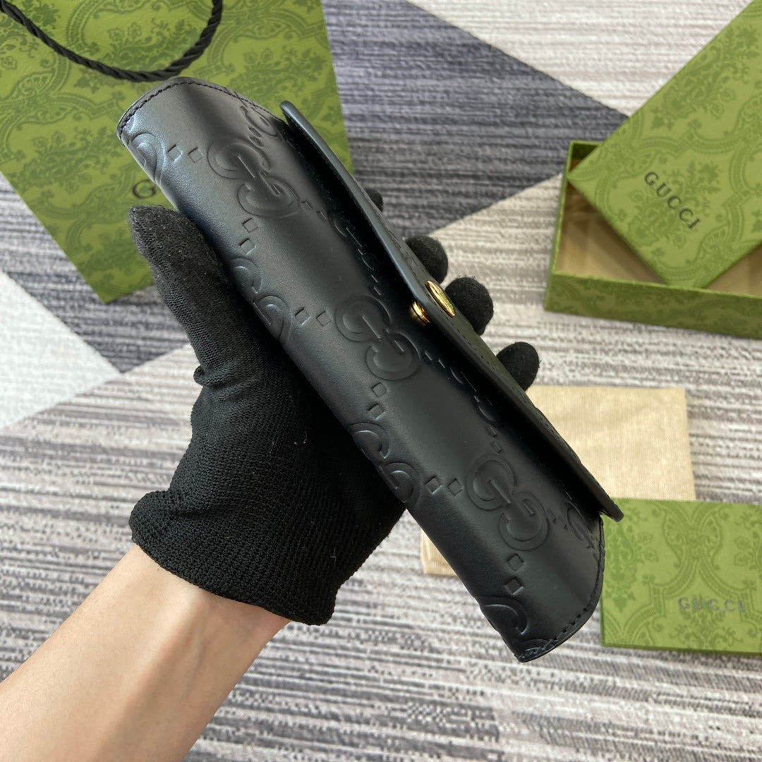 CONTINENTAL WALLET 19 IN BLACK EMBOSSED CALFSKIN GOLD HARDWARE