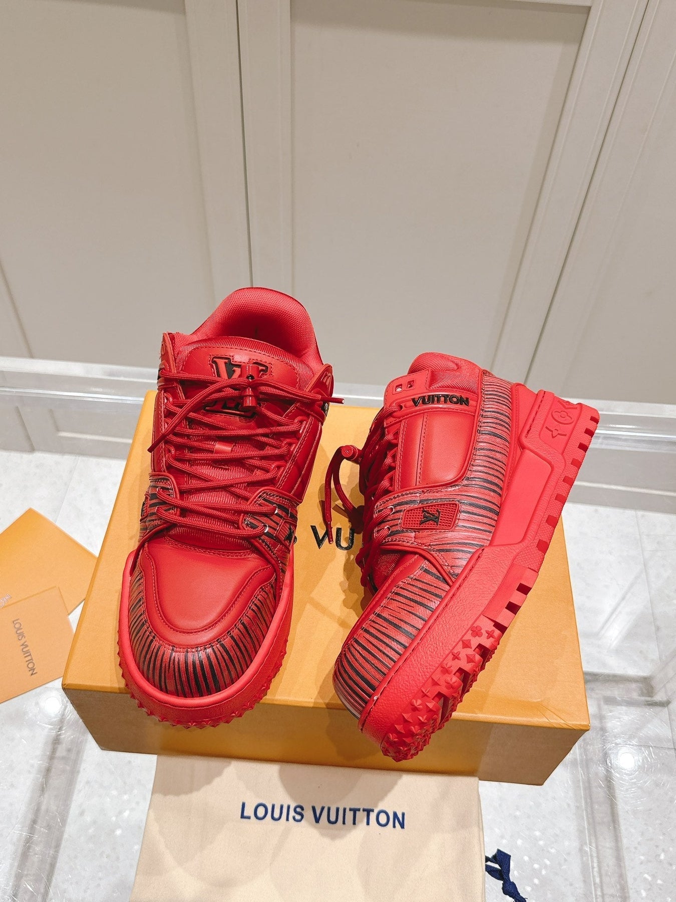 LV TRAINER MAXI LV X PARK SEO-BO IN RUBY RED CALFSKIN