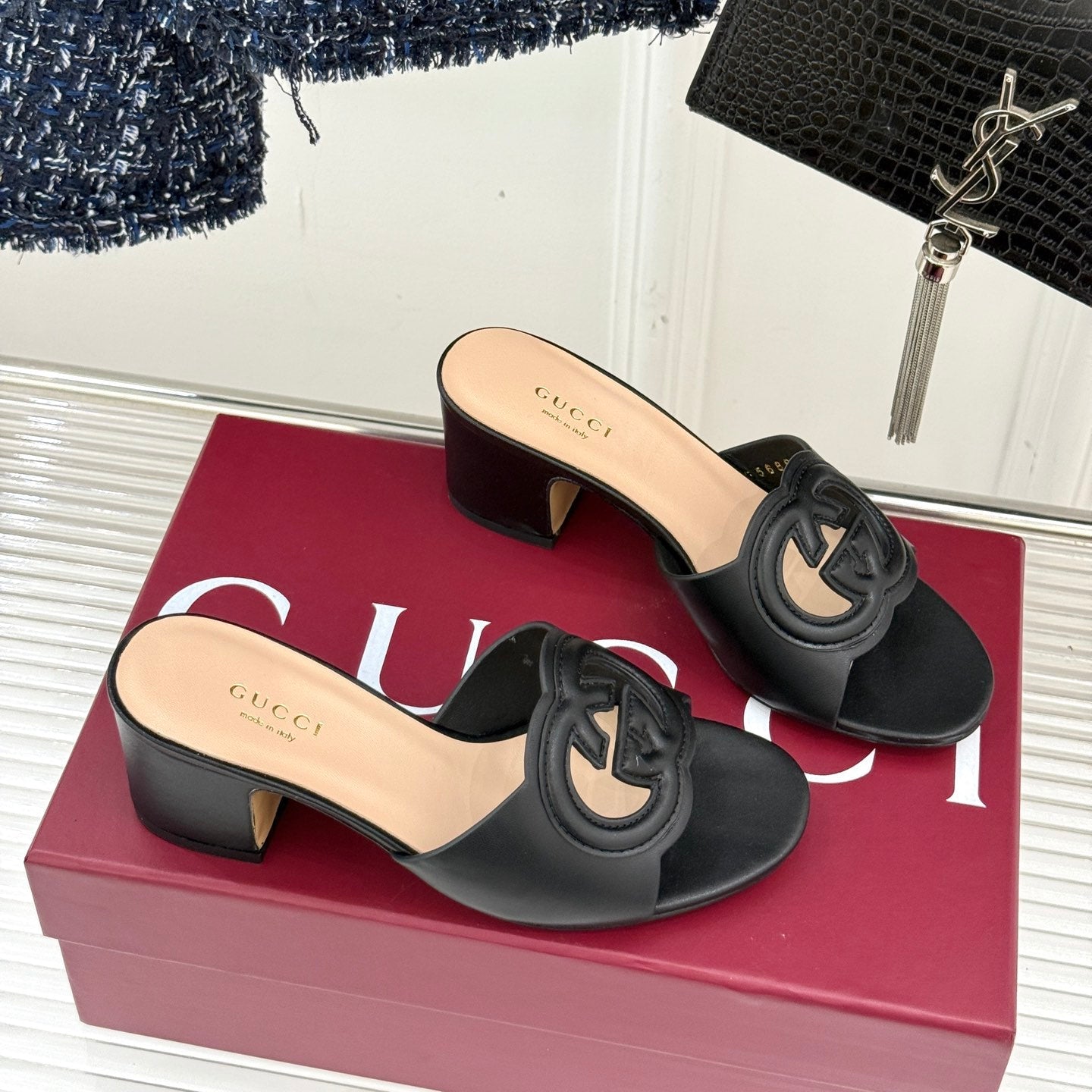 MID-HEEL MULE IN BLACK CALFSKIN