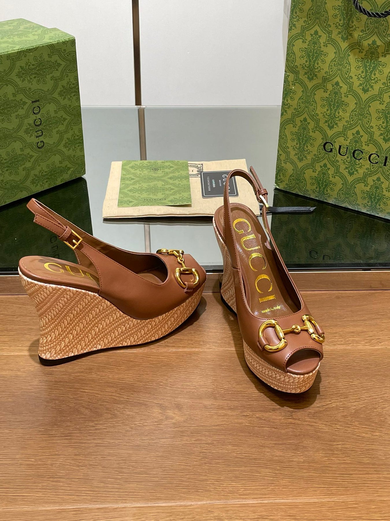 GG WEDGE PLATFORM IN CHOCOLATE BROWN CALFSKIN WITH GOLD HARDWARE