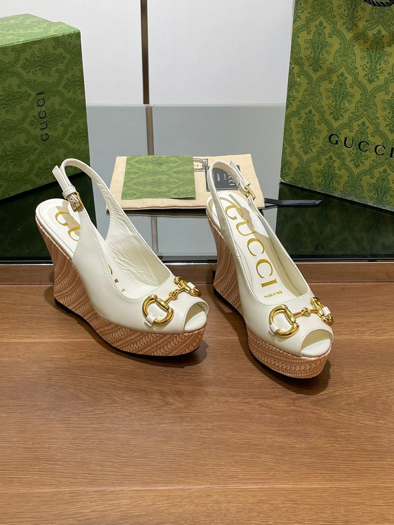 GG WEDGE PLATFORM IN WHITE CALFSKIN WITH GOLD HARDWARE