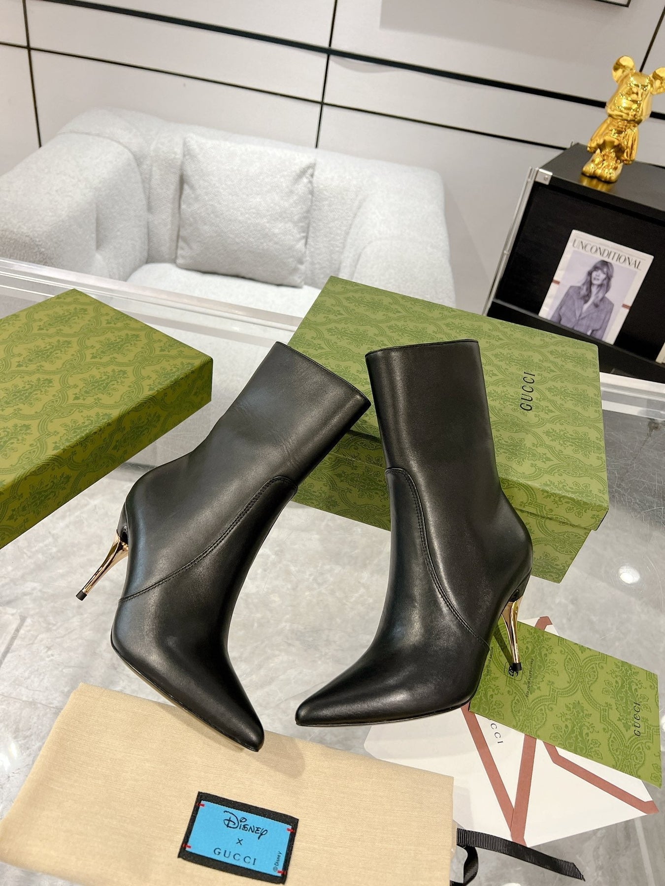 GG ANKLE BOOTS IN BLACK CALFSKIN WITH GOLD PLATED HEEL