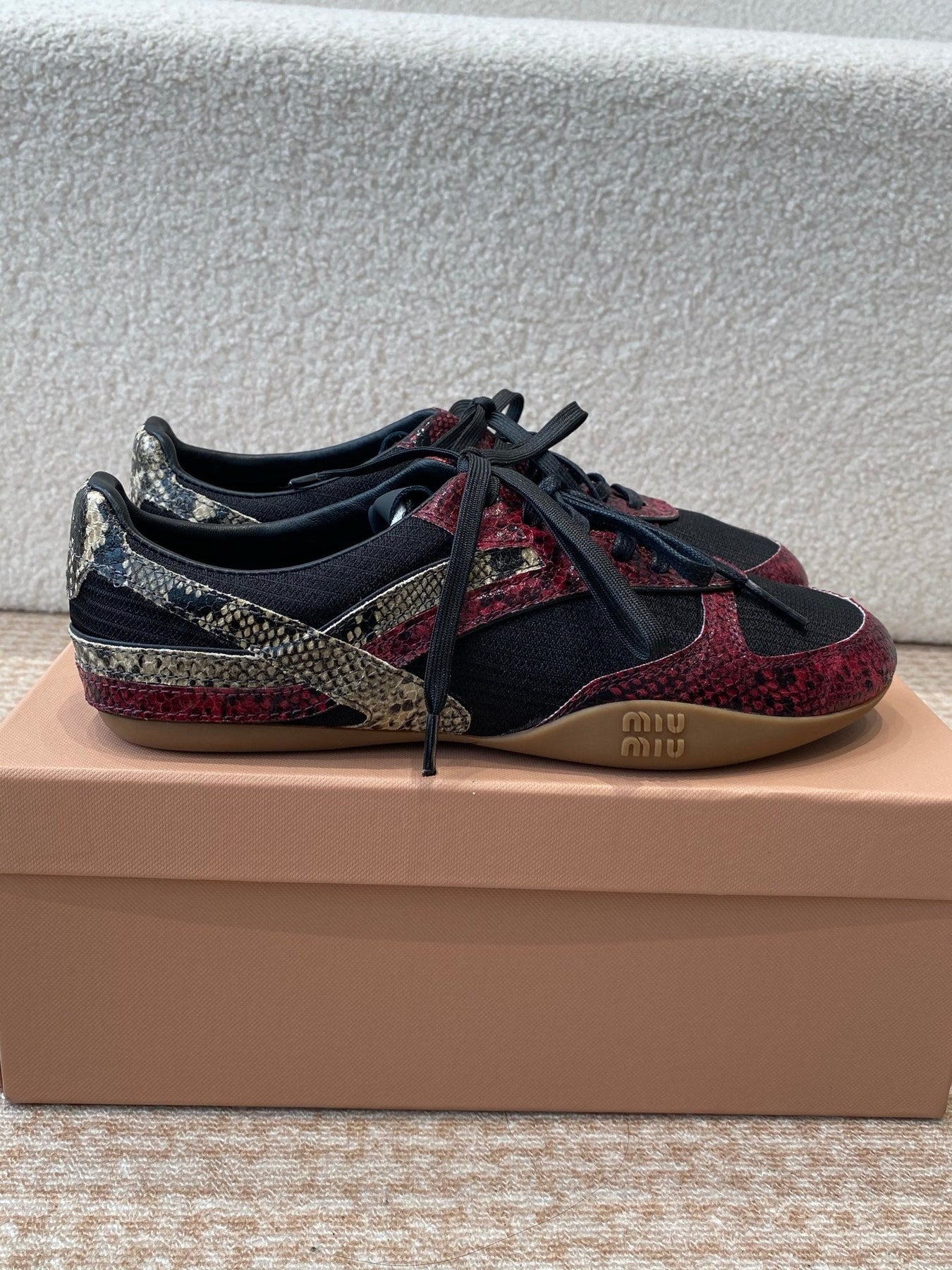 GYMNASIUM SNEAKER IN BLACK FABRIC AND BLACK RED SNAKE EFFECT CALFSKIN