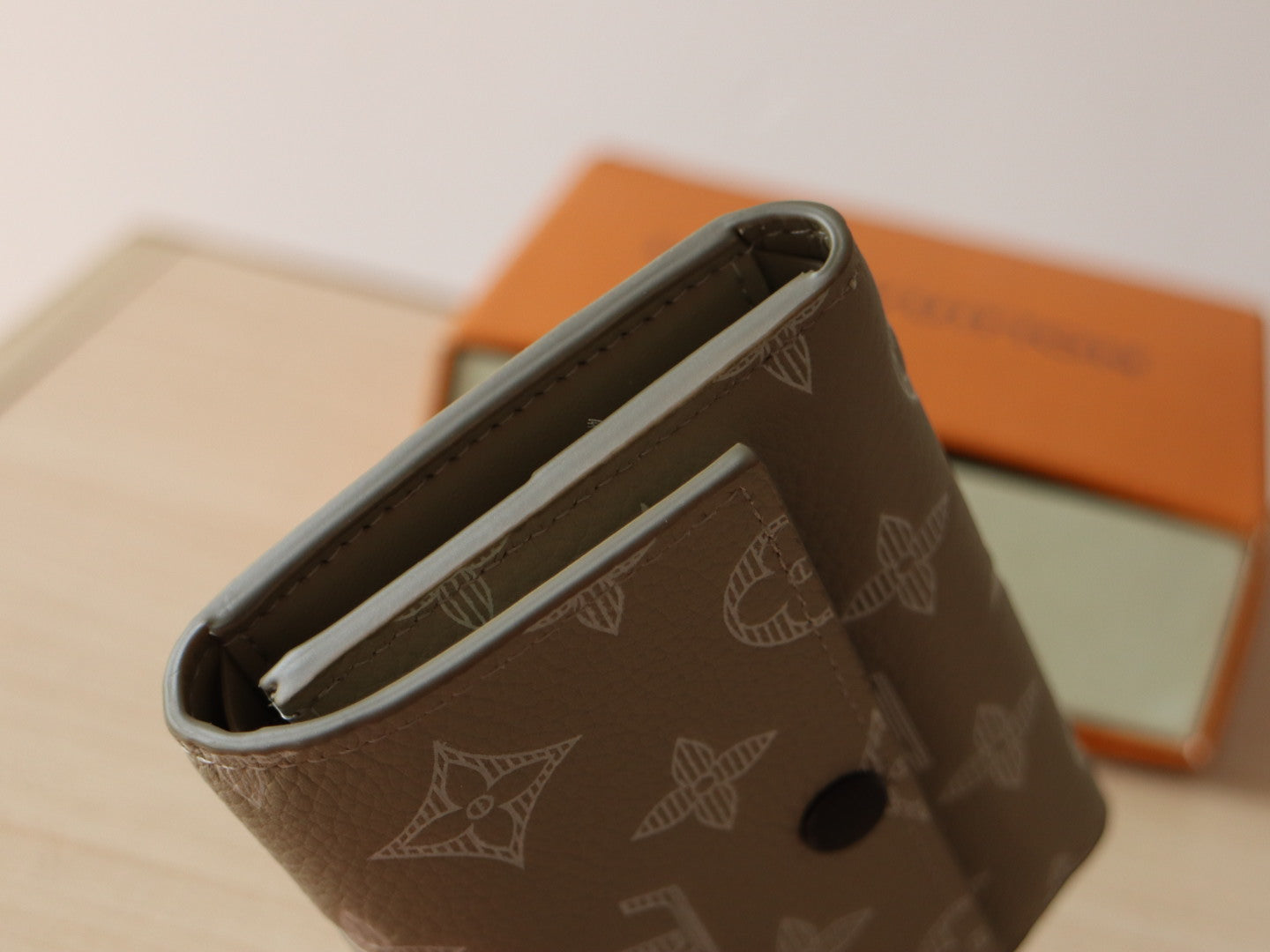 IRIS WALLET IN KHAKI BROWN EMBOSSED CALFSKIN