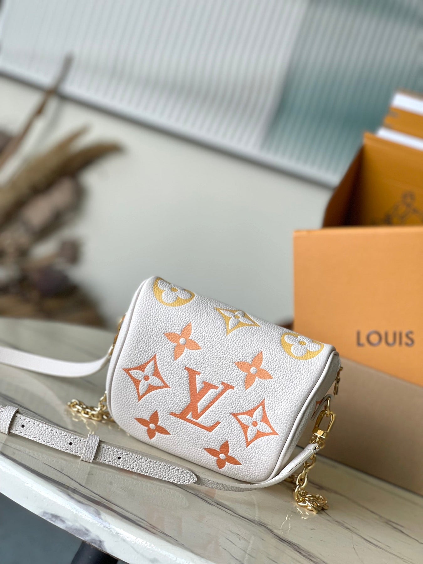 MINI BUMBAG 17 IN WHITE ORANGE MONOGRAM EMPREINTE LEATHER GOLD HARDWARE