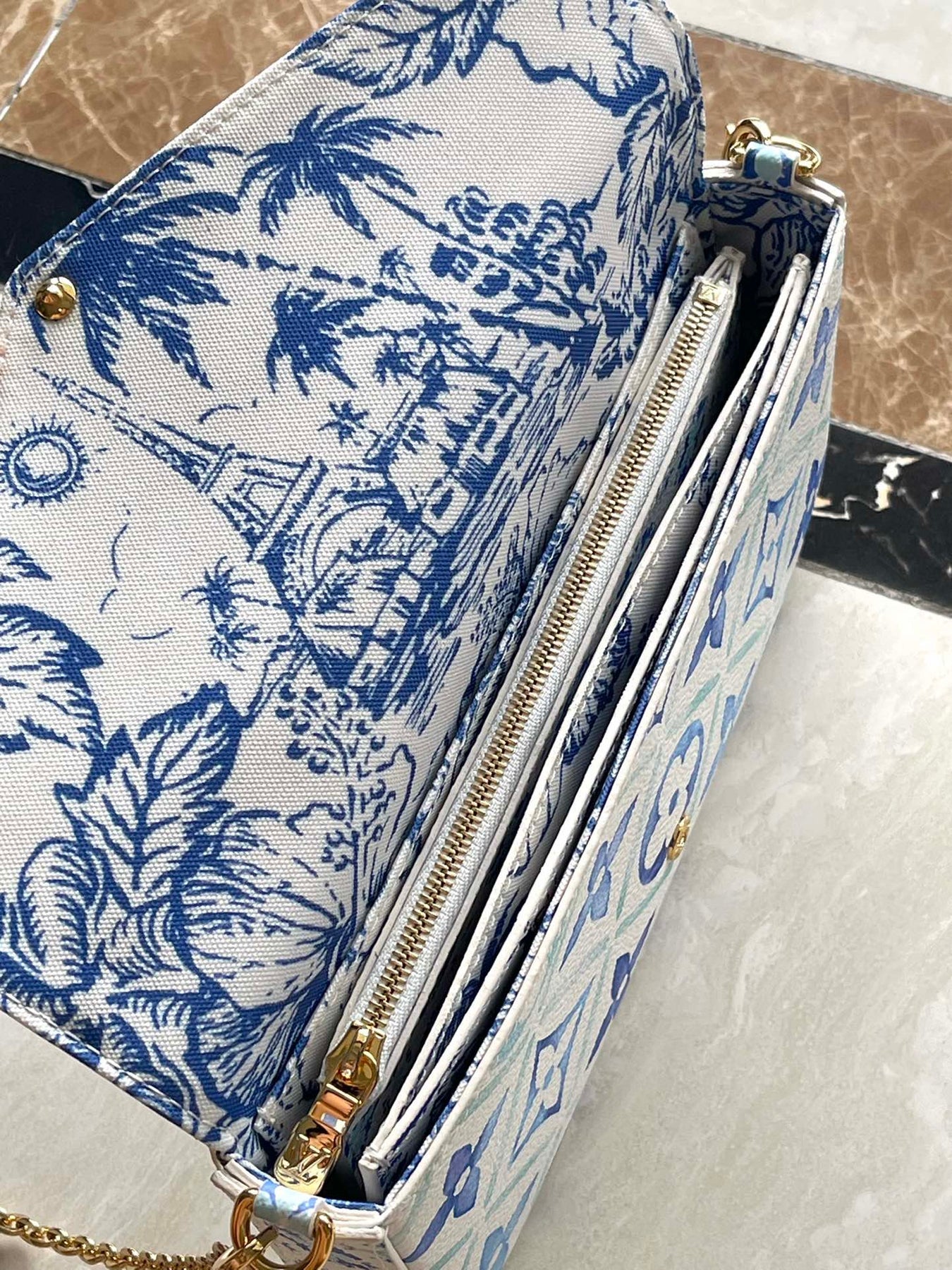 FÉLICIE POCHETTE 21 IN LAGOON BLUE MONOGRAM TILES CANVAS