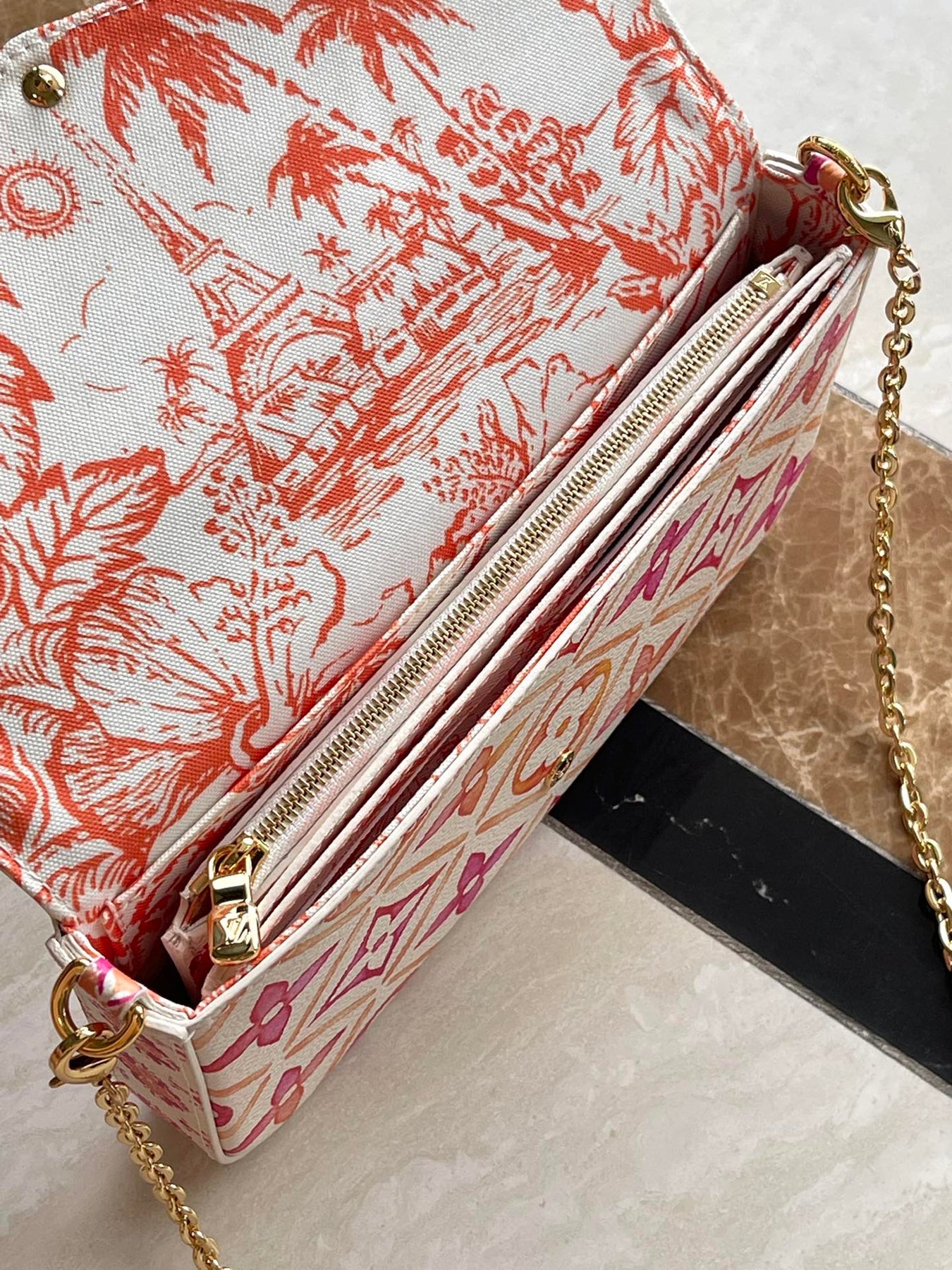 FÉLICIE POCHETTE 21 IN CORAL MONOGRAM TILES CANVAS