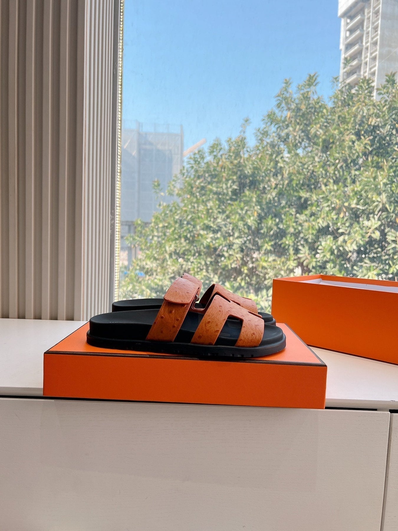 CHYPRE SANDAL IN VIVID ORANGE GRAINED CALFSKIN