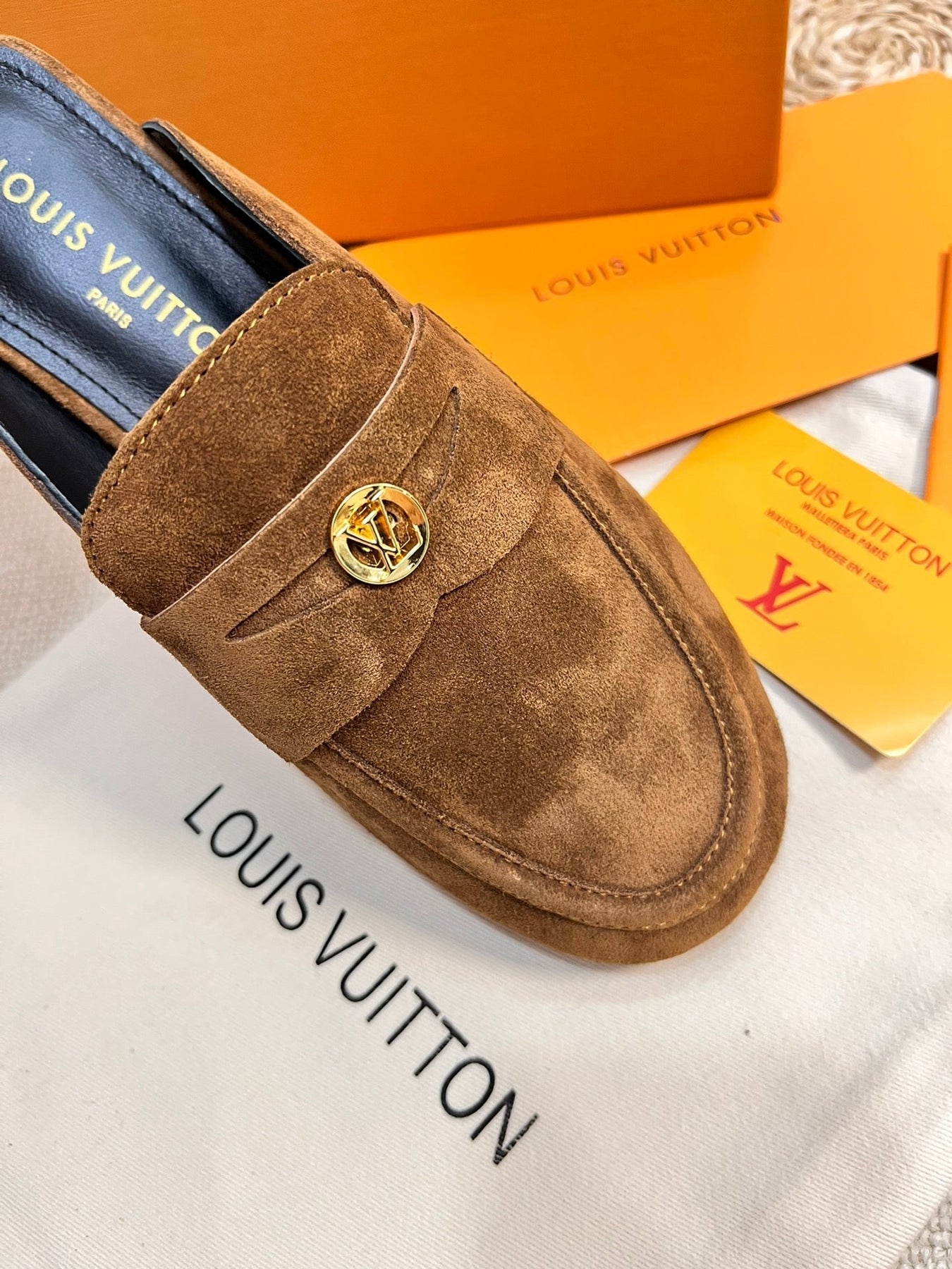 LV CAPRI OPEN BACK LOAFERS IN CHOCOLATE BROWN SUEDE