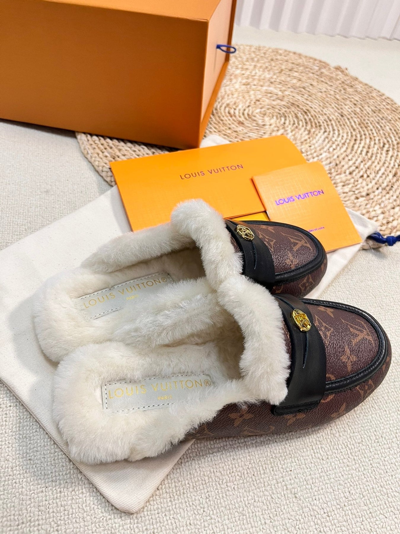 FLAT MULE IN CHESTNUT BROWN MONOGRAM CALFSKIN AND SHEARLING LINING