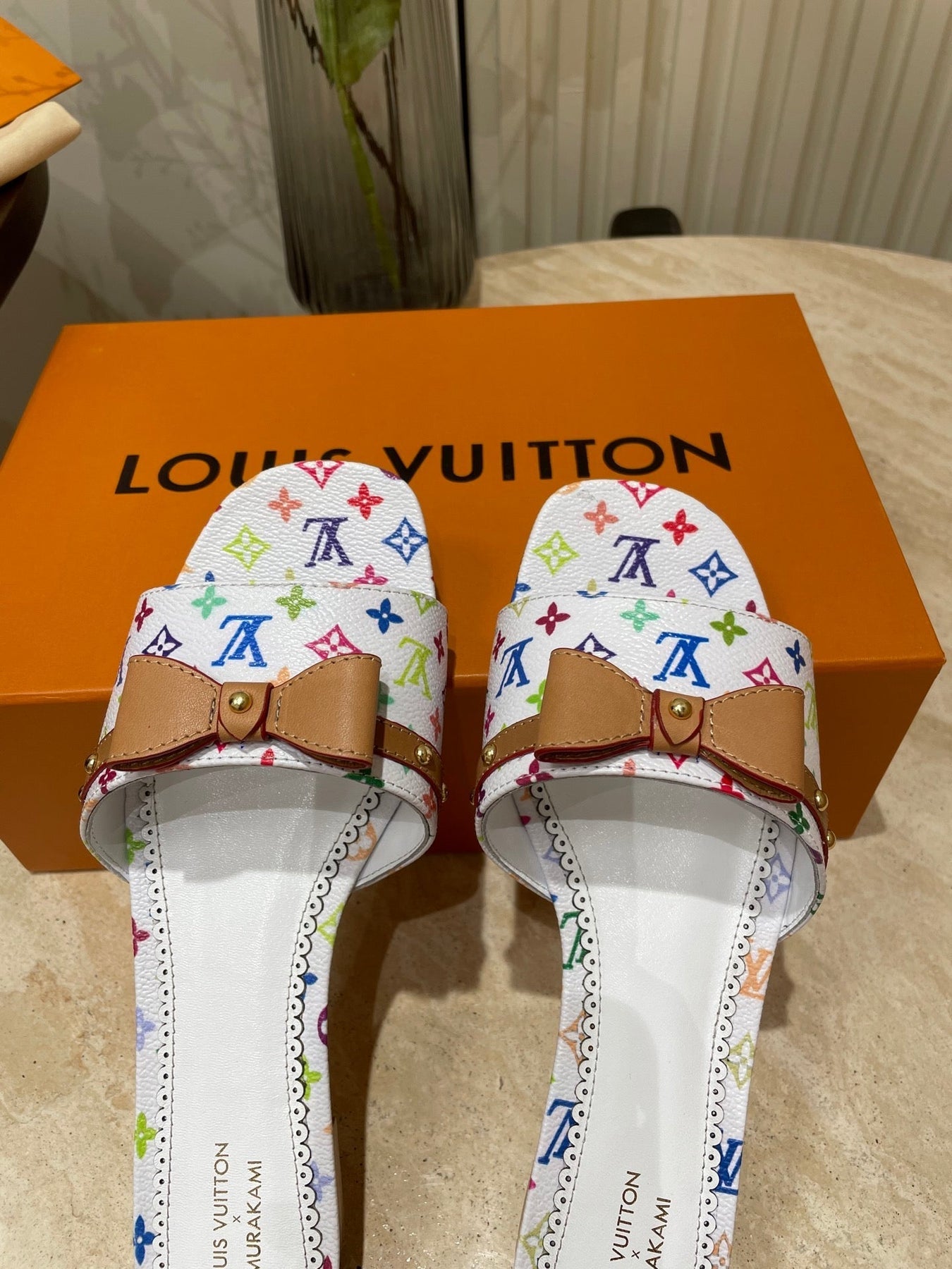 FLAT MULES IN WHITE MONOGRAM LAMBSKIN