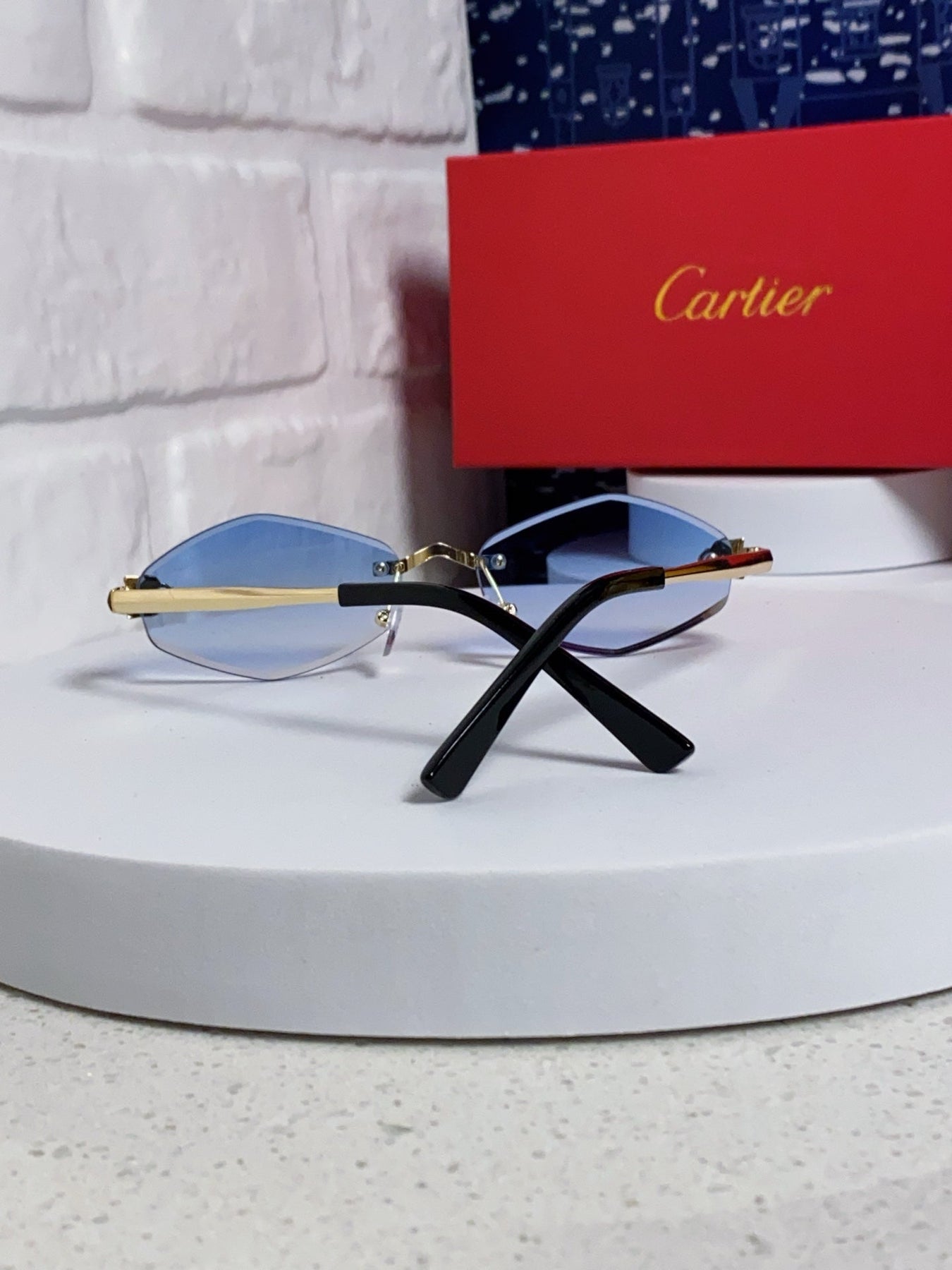 PANTHÈRE RIMLESS RHOMBUS FRAME SUNGLASSES CT0443S IN METAL