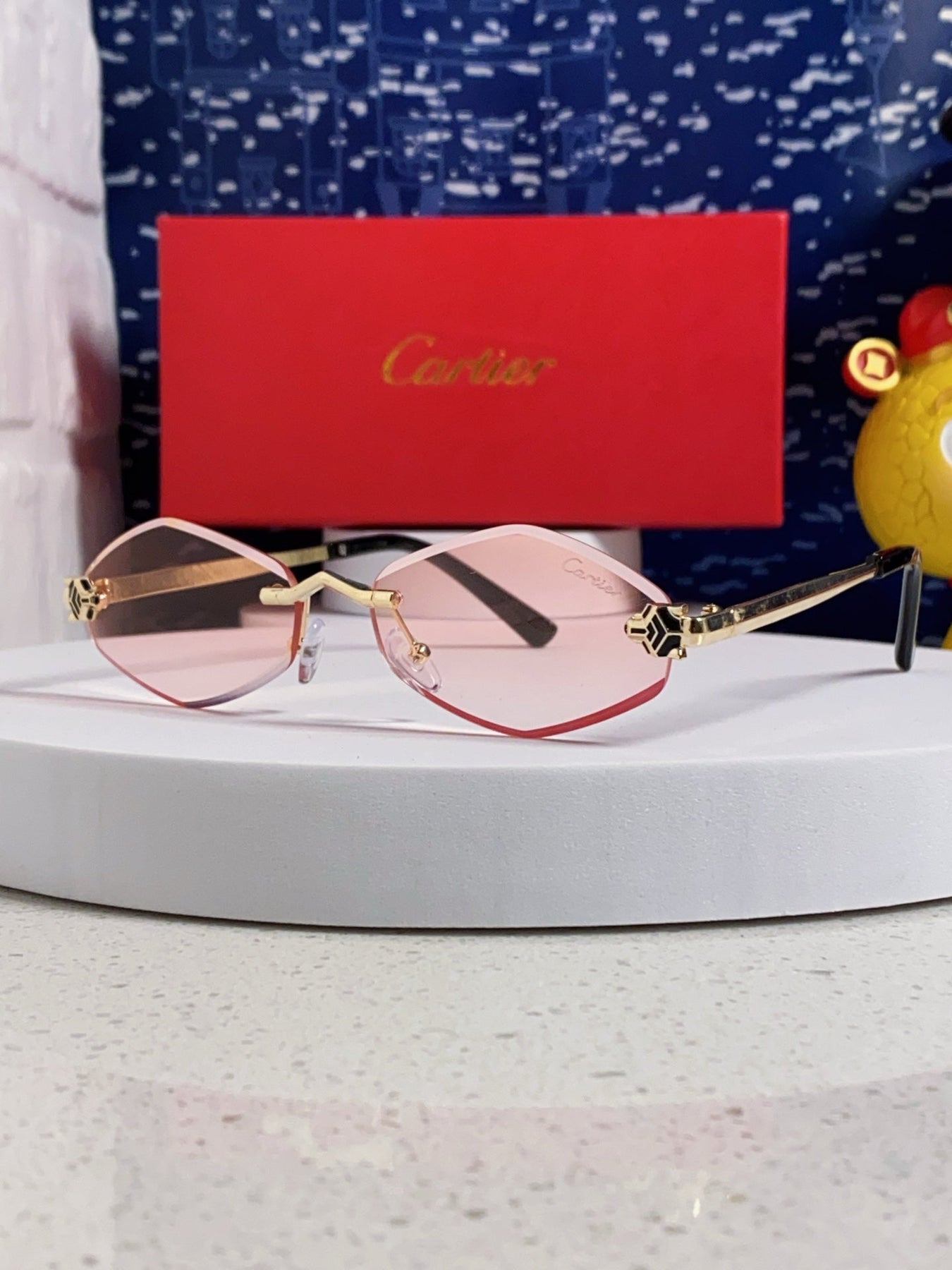 PANTHÈRE RIMLESS RHOMBUS FRAME SUNGLASSES CT0443S IN METAL