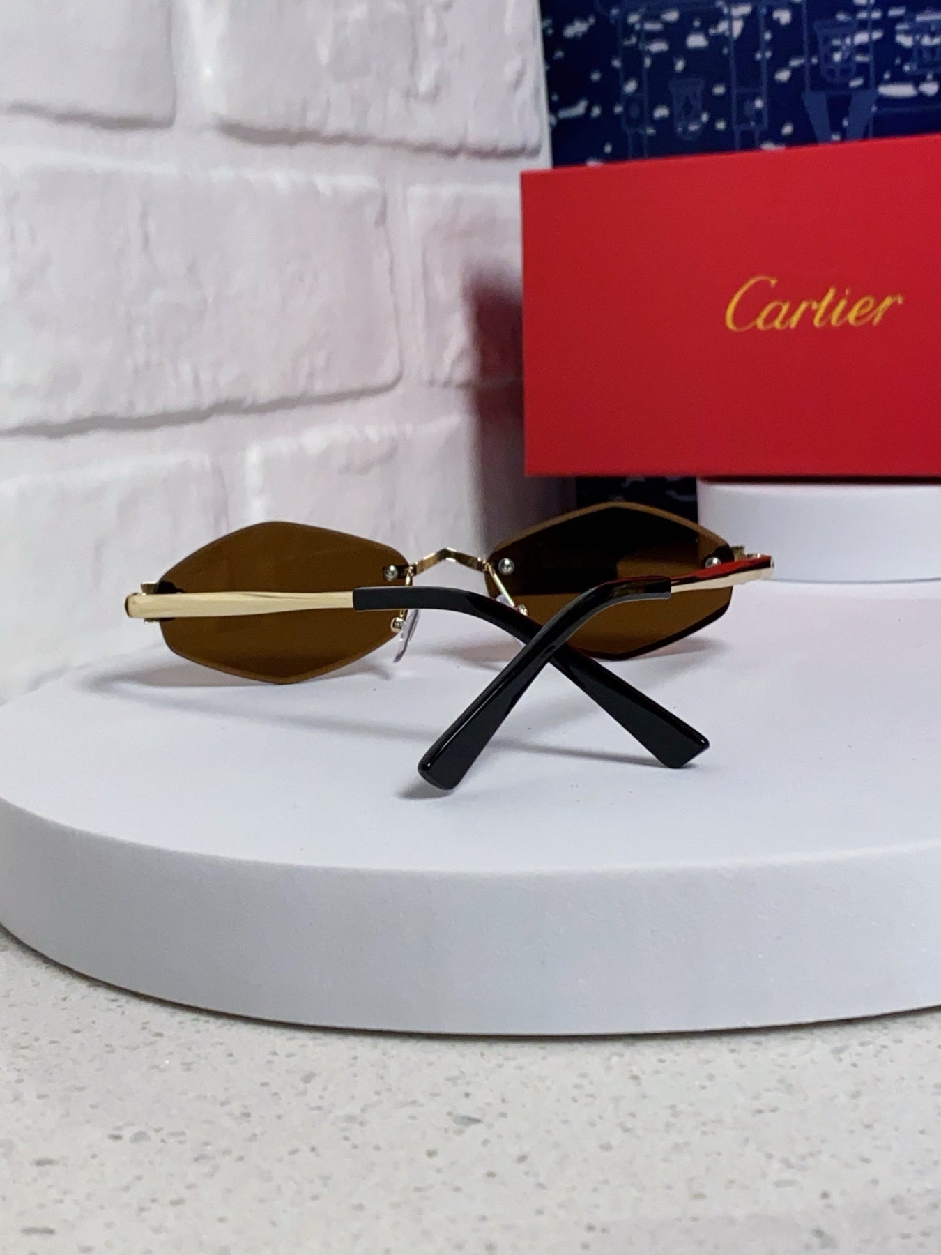 PANTHÈRE RIMLESS RHOMBUS FRAME SUNGLASSES CT0443S IN METAL