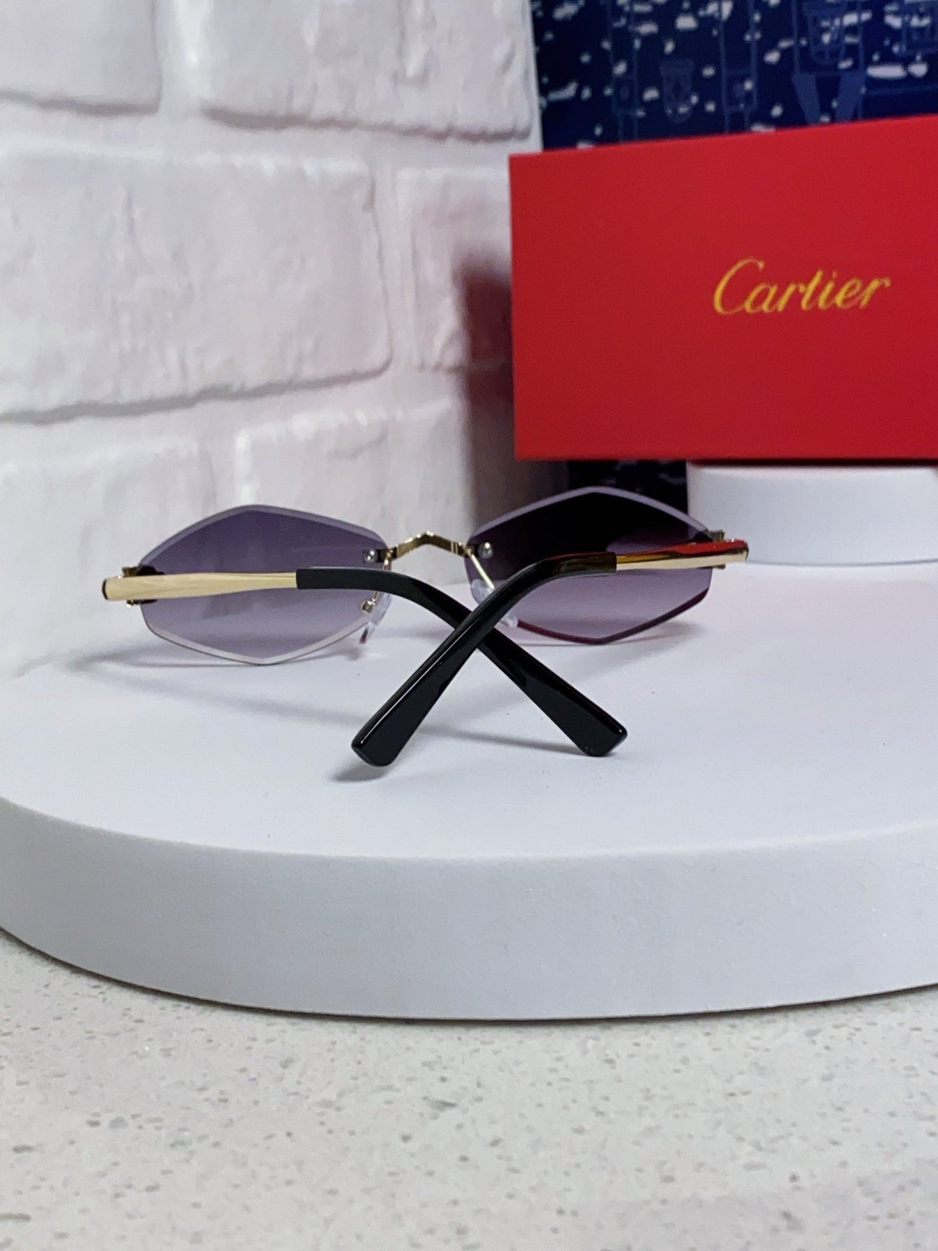 PANTHÈRE RIMLESS RHOMBUS FRAME SUNGLASSES CT0443S IN METAL