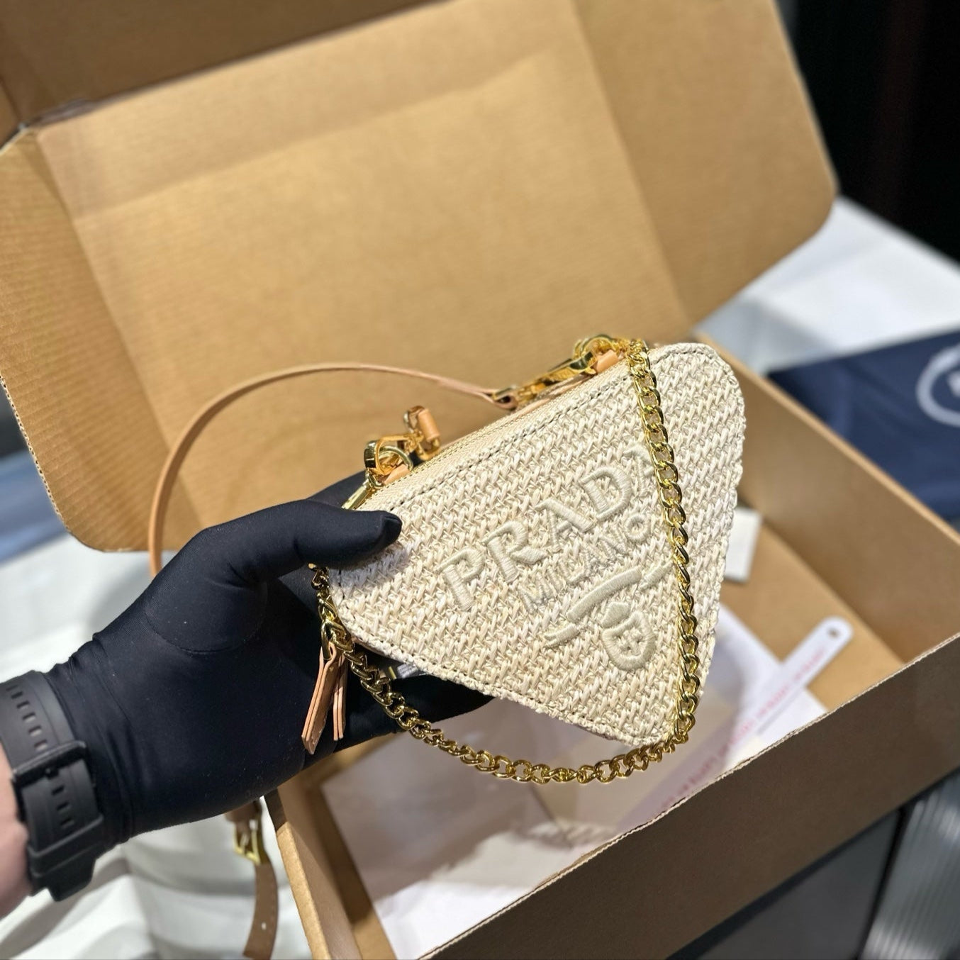 EMBROIDED LOGO TRIANGLE BAG 18 IN BEIGE WOVEN RAFFIA GOLD CHAIN