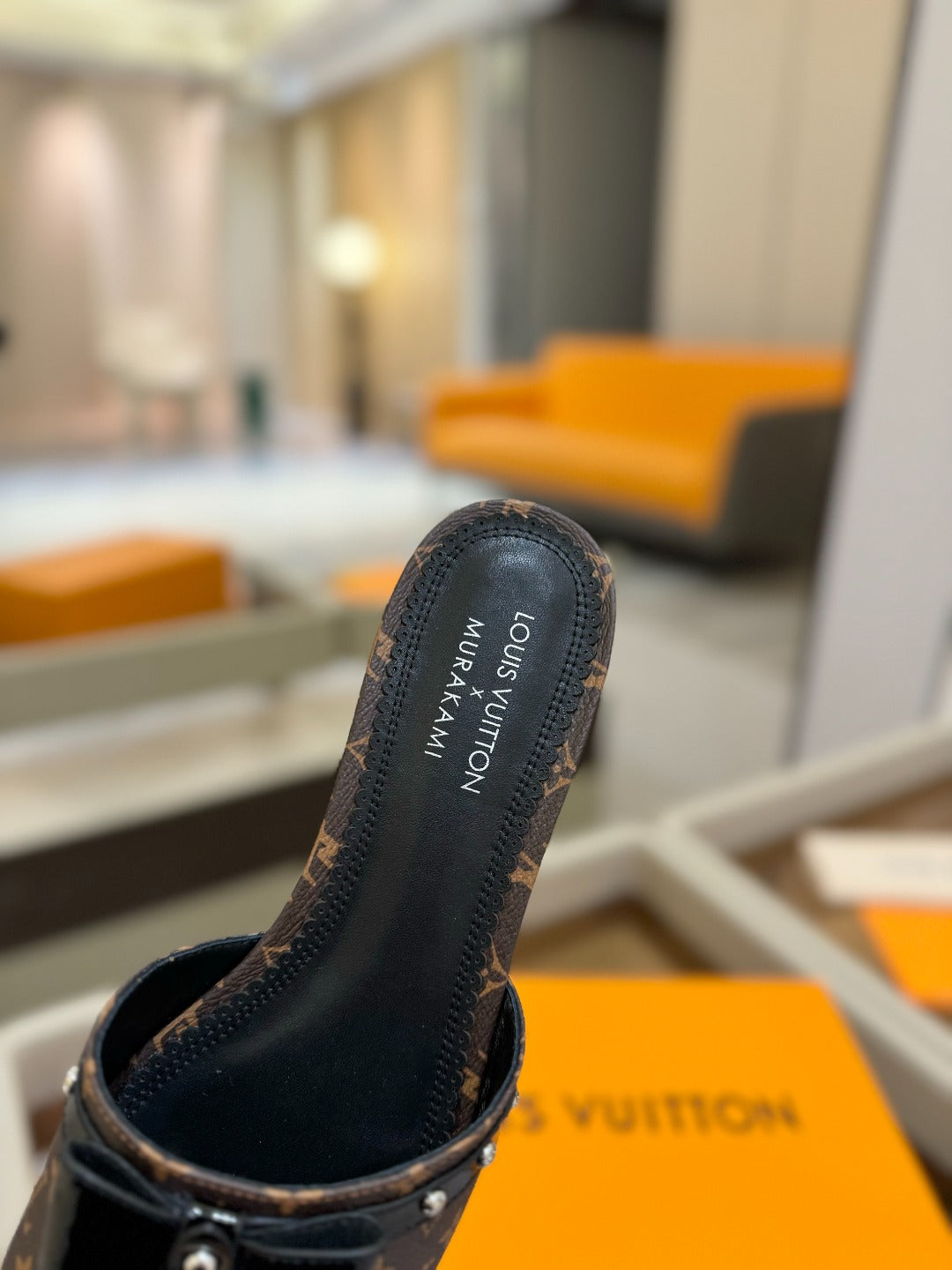 LV X TM 6AM FLAT MULE IN CHOCOLATE BROWN MONOGRAM CALFSKIN