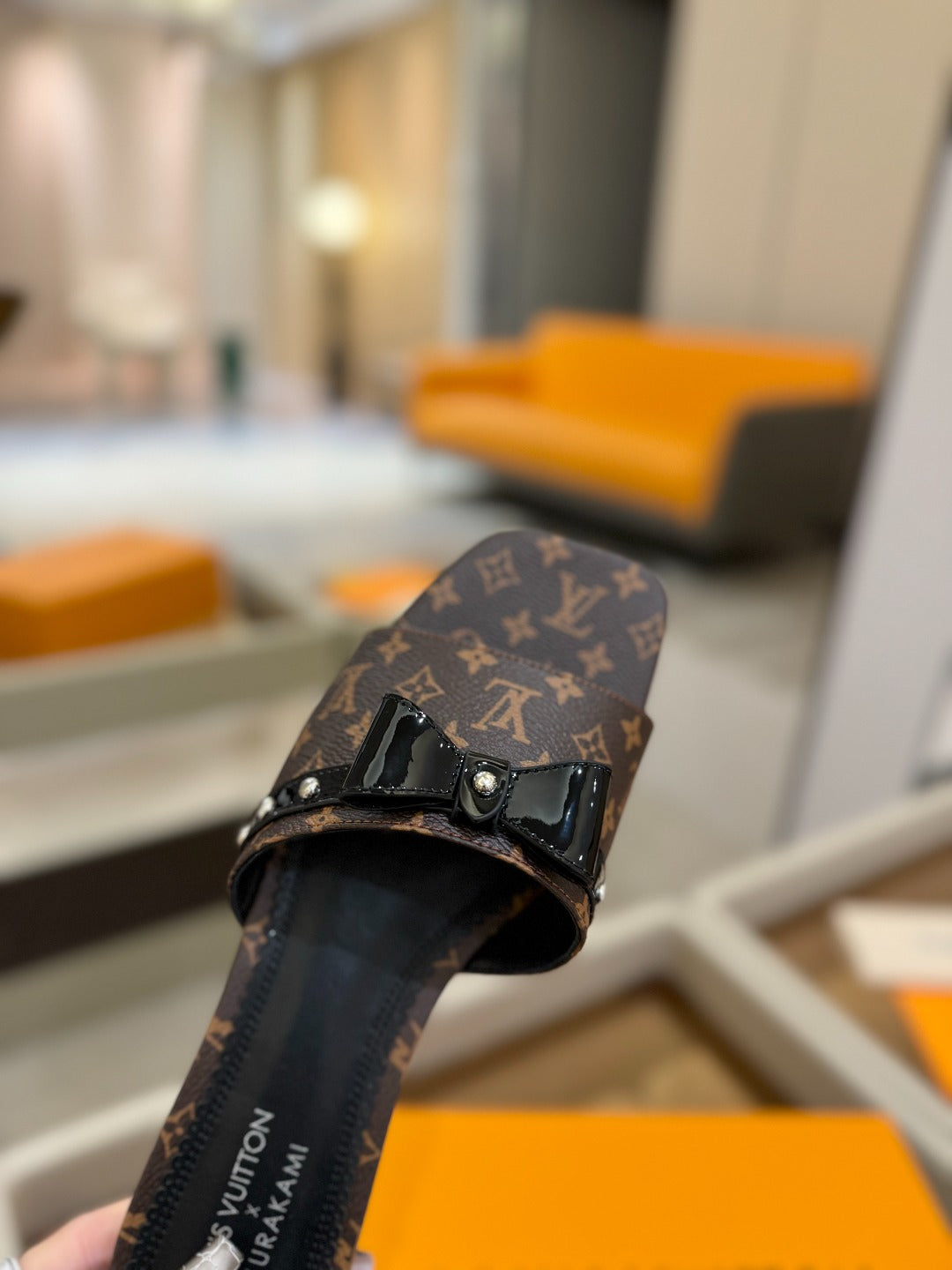 LV X TM 6AM FLAT MULE IN CHOCOLATE BROWN MONOGRAM CALFSKIN