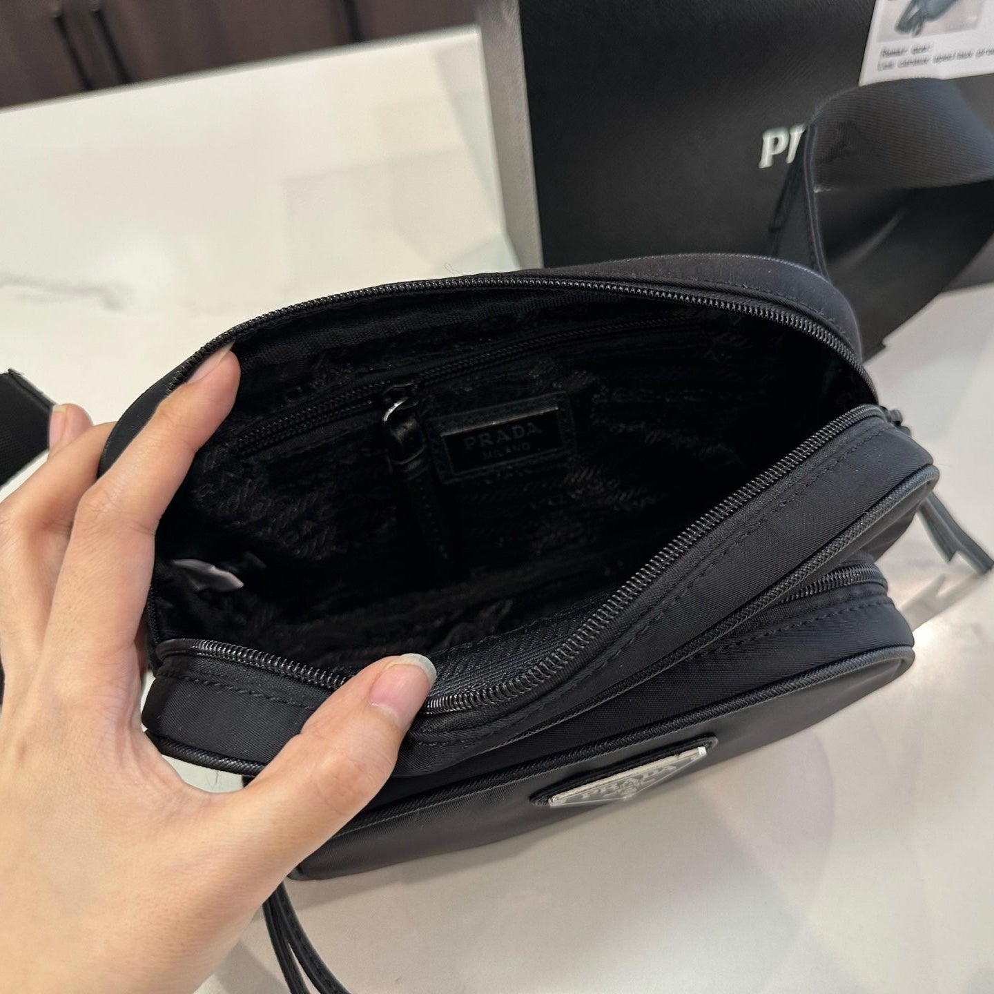 FRONT ZIP POCKET CROSSBODY BAG 24 IN BLACK RE-NYLON